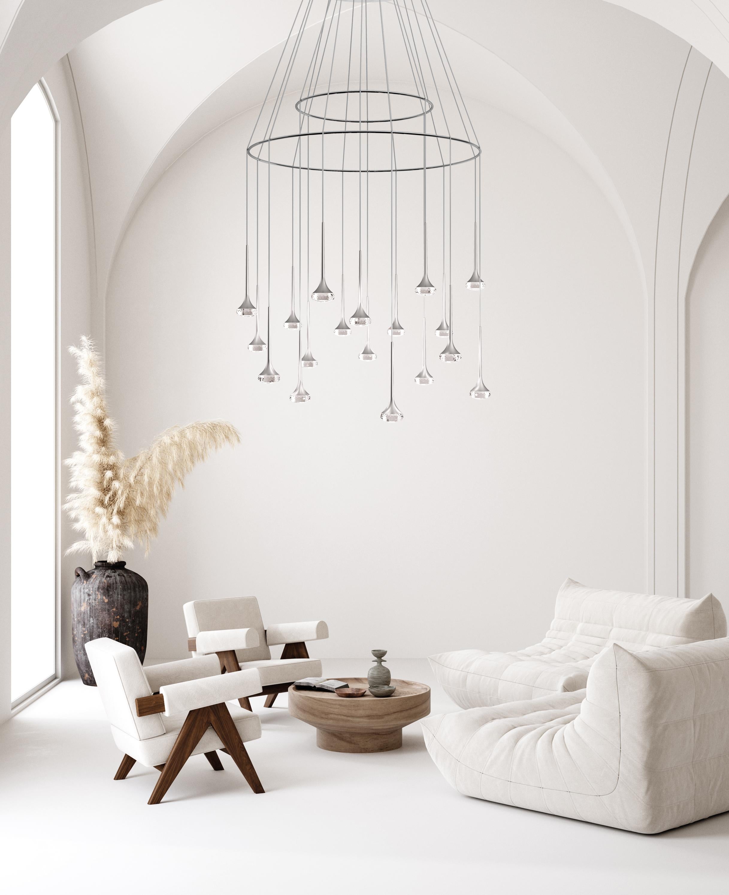 Axolight Fairy Large Suspension Pendant Lamp with White Chrome Finish and Metal Body in Crystal by Manuel & Vanessa Vivian

Multiple reflections and iridiscent symmetries go through the matter to generate new forms. The clarity of aluminum meets the