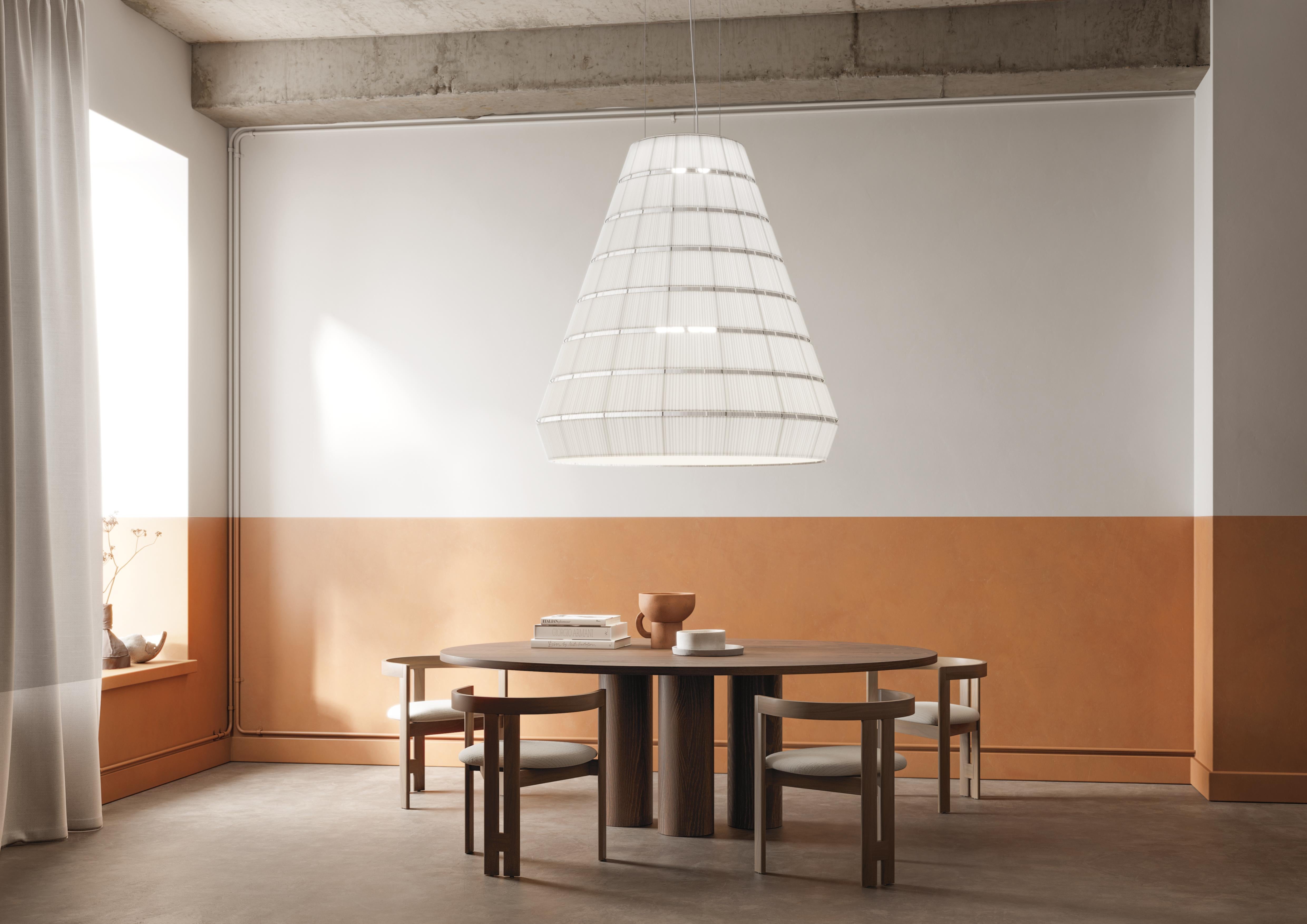 Axolight Layers Type A Pendant Lamp in White Steel by Vanessa Vivian

Layers is a collection of suspension lamps with a strong sculptural presence, obtained through combinations of different geometric shapes. Its layered system is modular, which