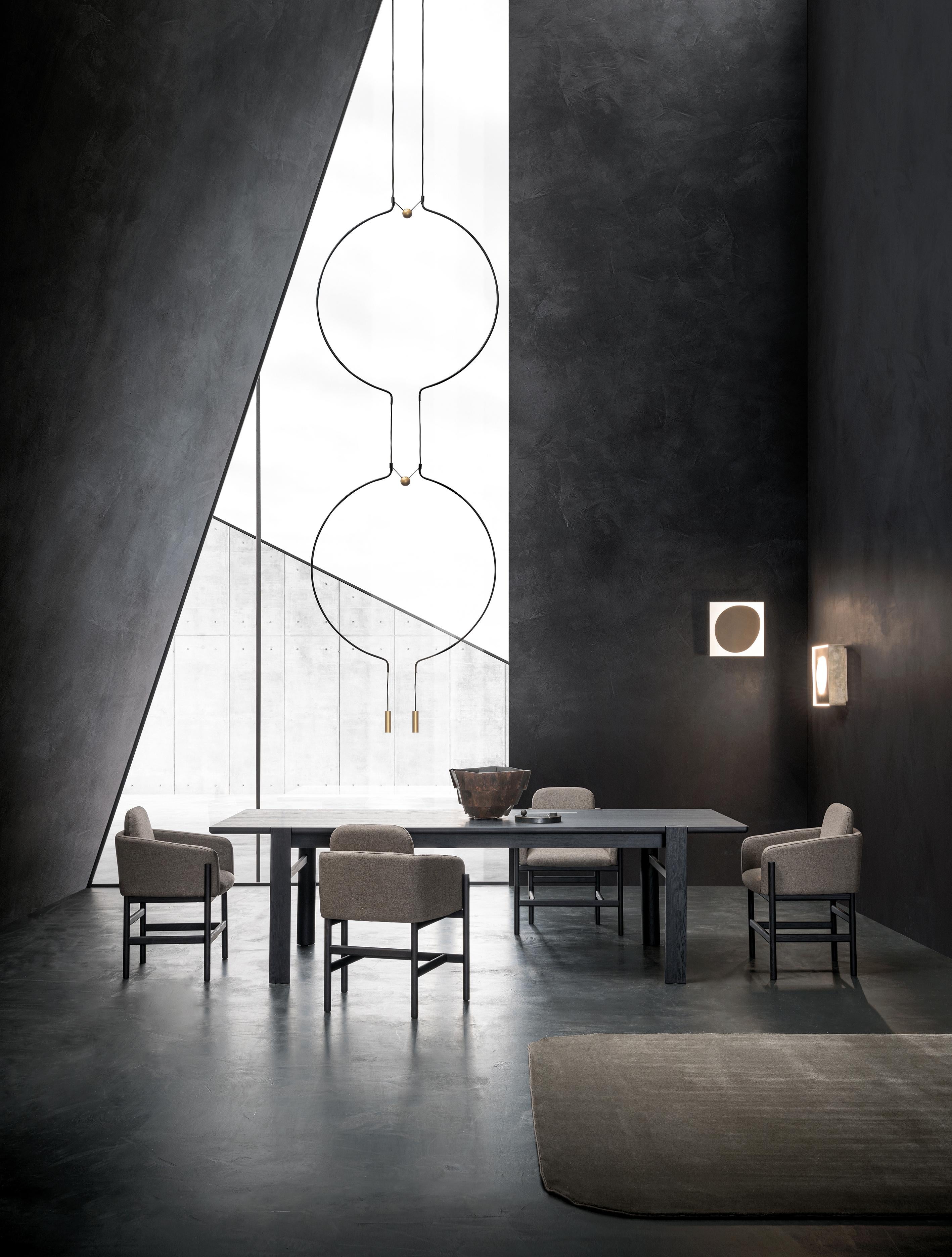 Axolight Liaison Model M4 Pendant Lamp in Black/Black by Sara Moroni

Modular lightness and elegance. Liaison tells about the perfect balance of three geometric archetypes: sphere, circle and cylinder compose a system that includes the single