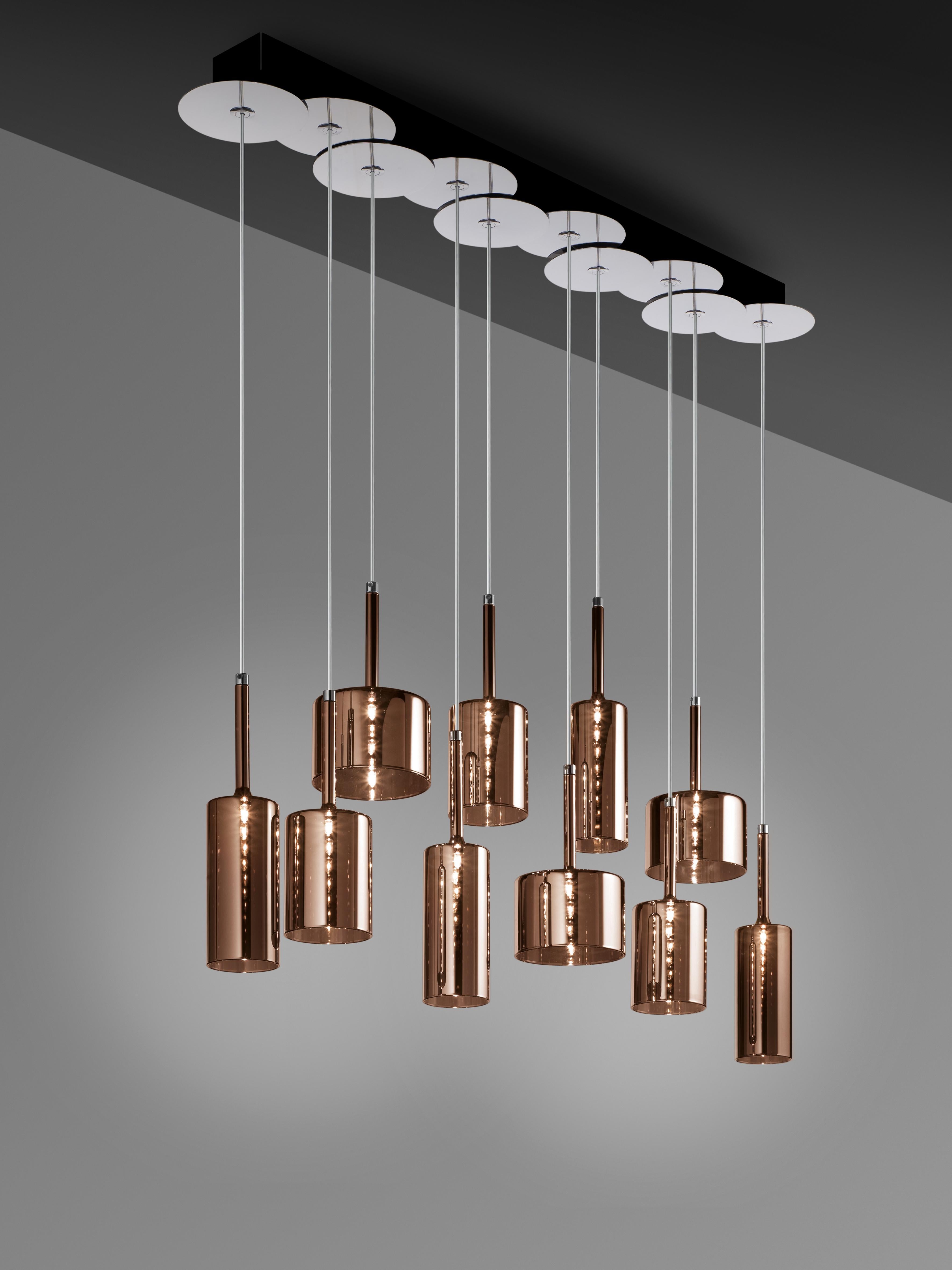 Axolight Spillray 10 Light Pendant Lamp with Chrome Metal Body in Bronze by Manuel & Vanessa Vivian

The delicacy of the glass expresses a pure but gently refined light. With its clean and essential design, Spillray is able to illuminate any space