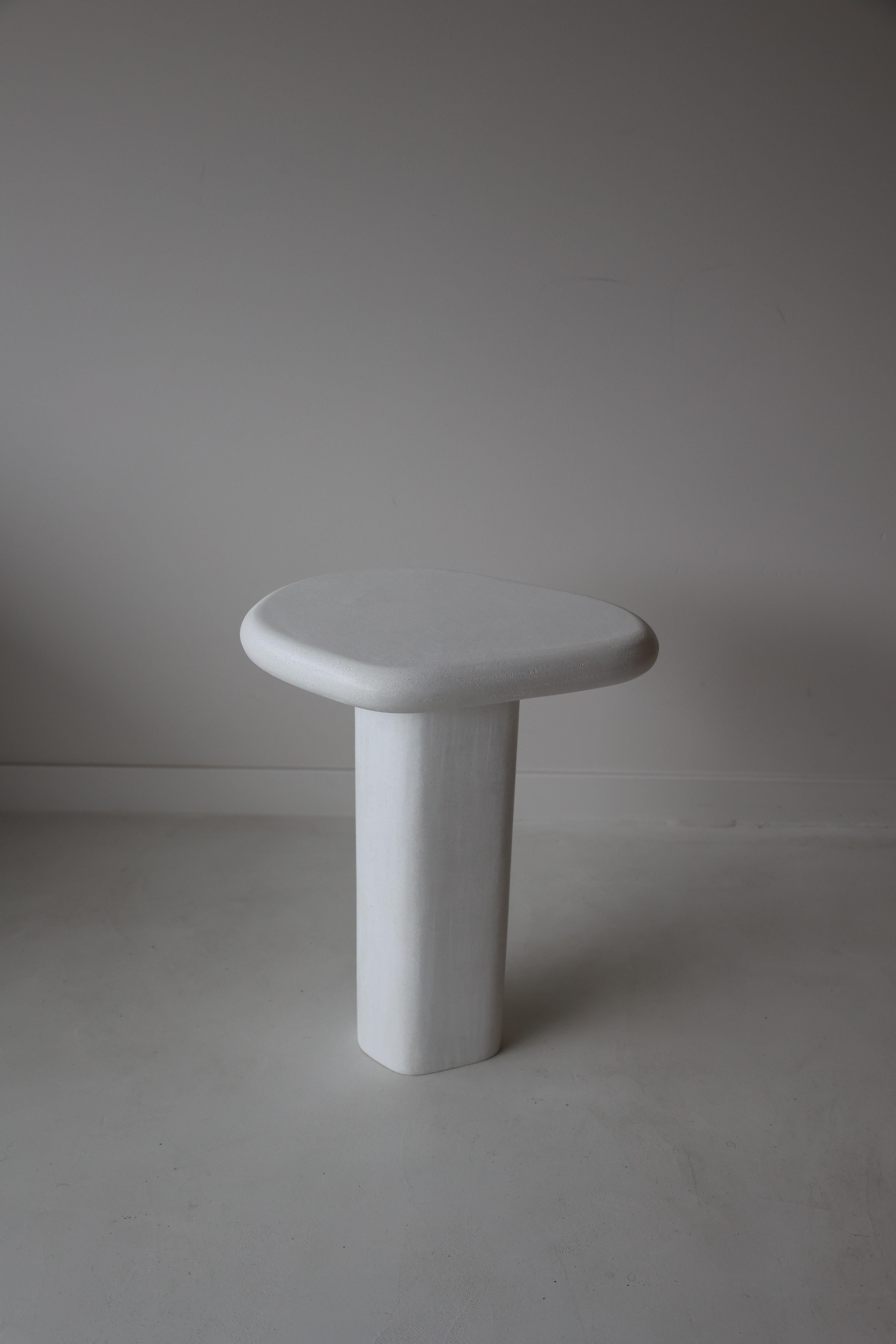 Aya Side Table by Kasanai
Dimensions: D 25 x W 26 x H 45 cm.
Materials: Lime plaster.
Also available in different colors. Please contact us.

Aya is a small but perfectly formed side table which comes as an individual piece or in a nest. Finished
