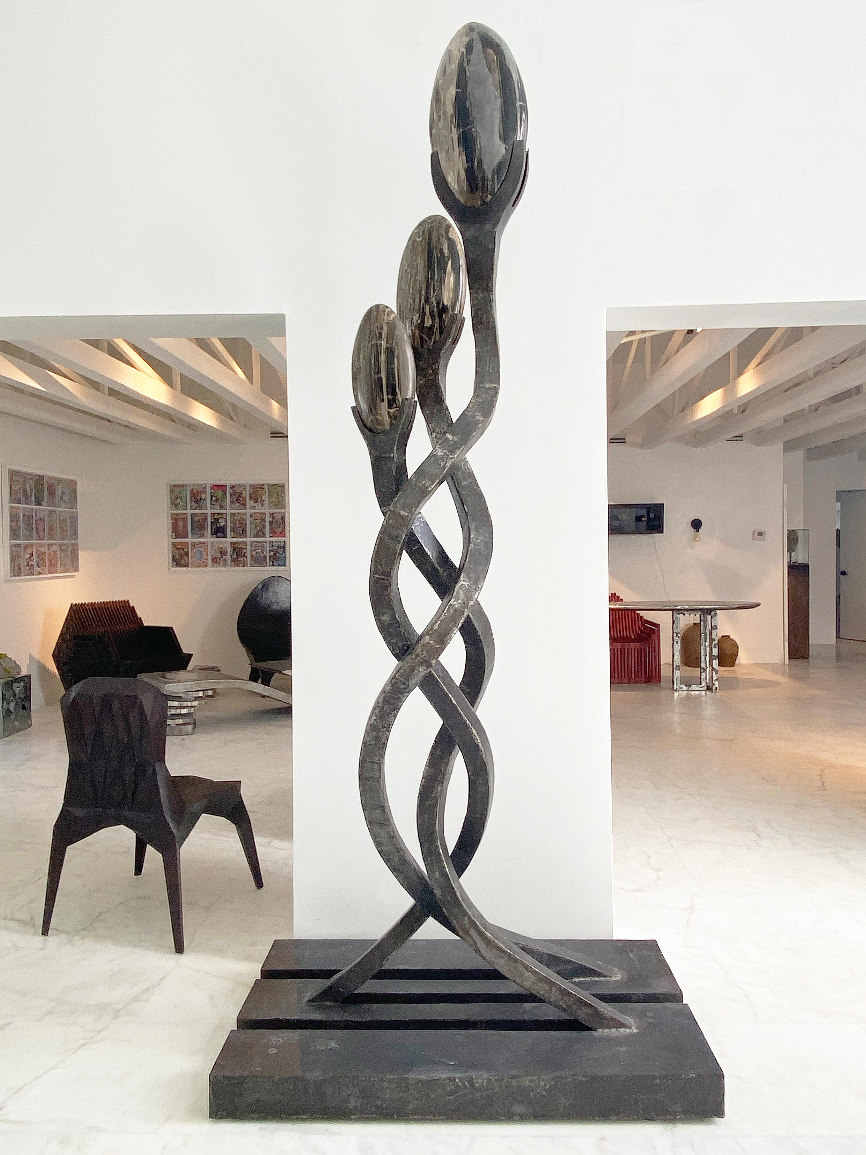 Inspired by a spiritual journey in the Peruvian Amazon, this sculpture depicts the elegant serpentine vines of the ayahuasca plant twisting toward the sky. A Quechua word meaning the 