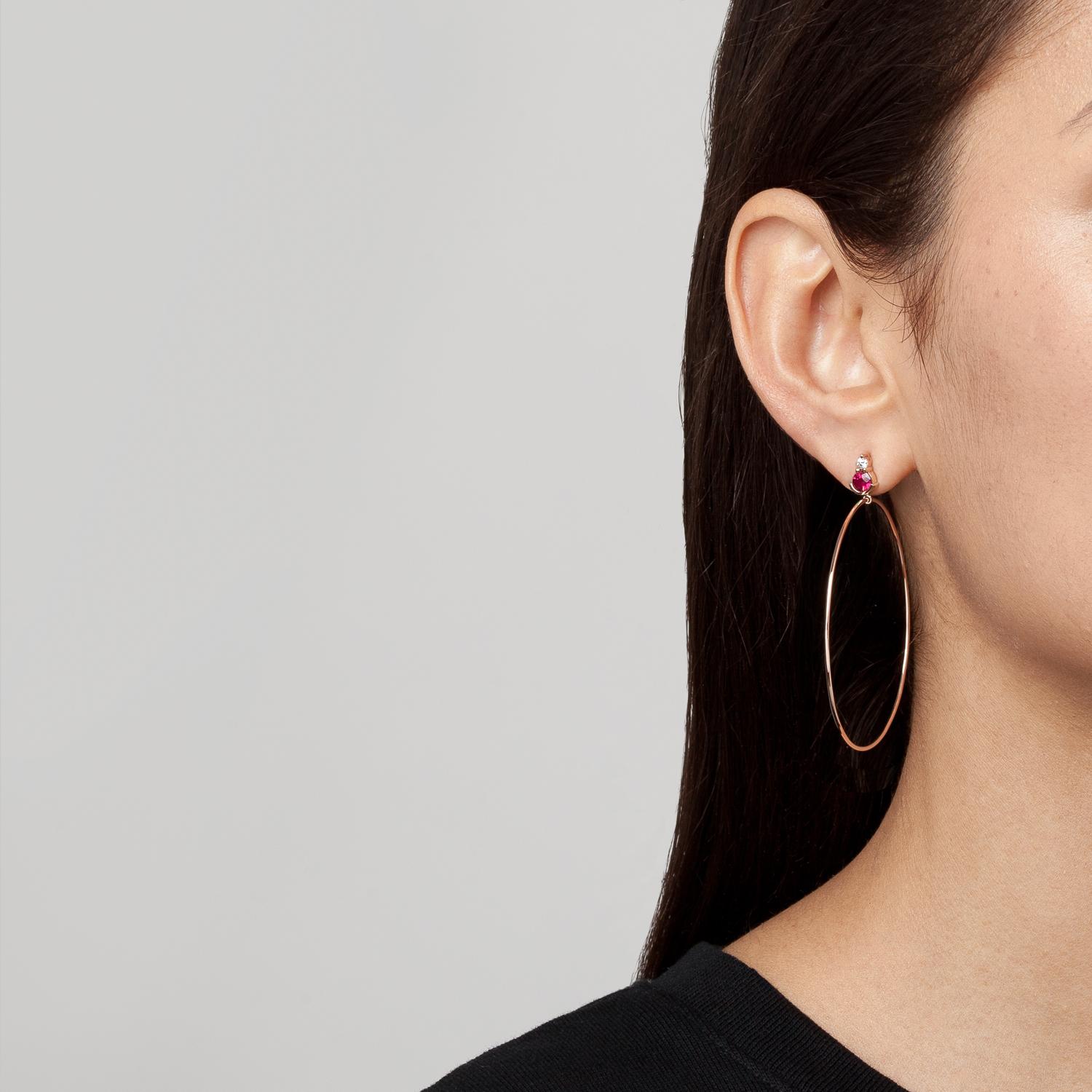 A stud and hoop hybrid, SELIN KENT's wearable Ayda Earrings make a subtle statement. Featuring lovely pinkish-red rubies with diamond accents and a 2'' gold hoop. 

Hoops measure 2'' / 5cm in diameter. 
Total carat weight: 0.85 carats (Rubys 0.7c,