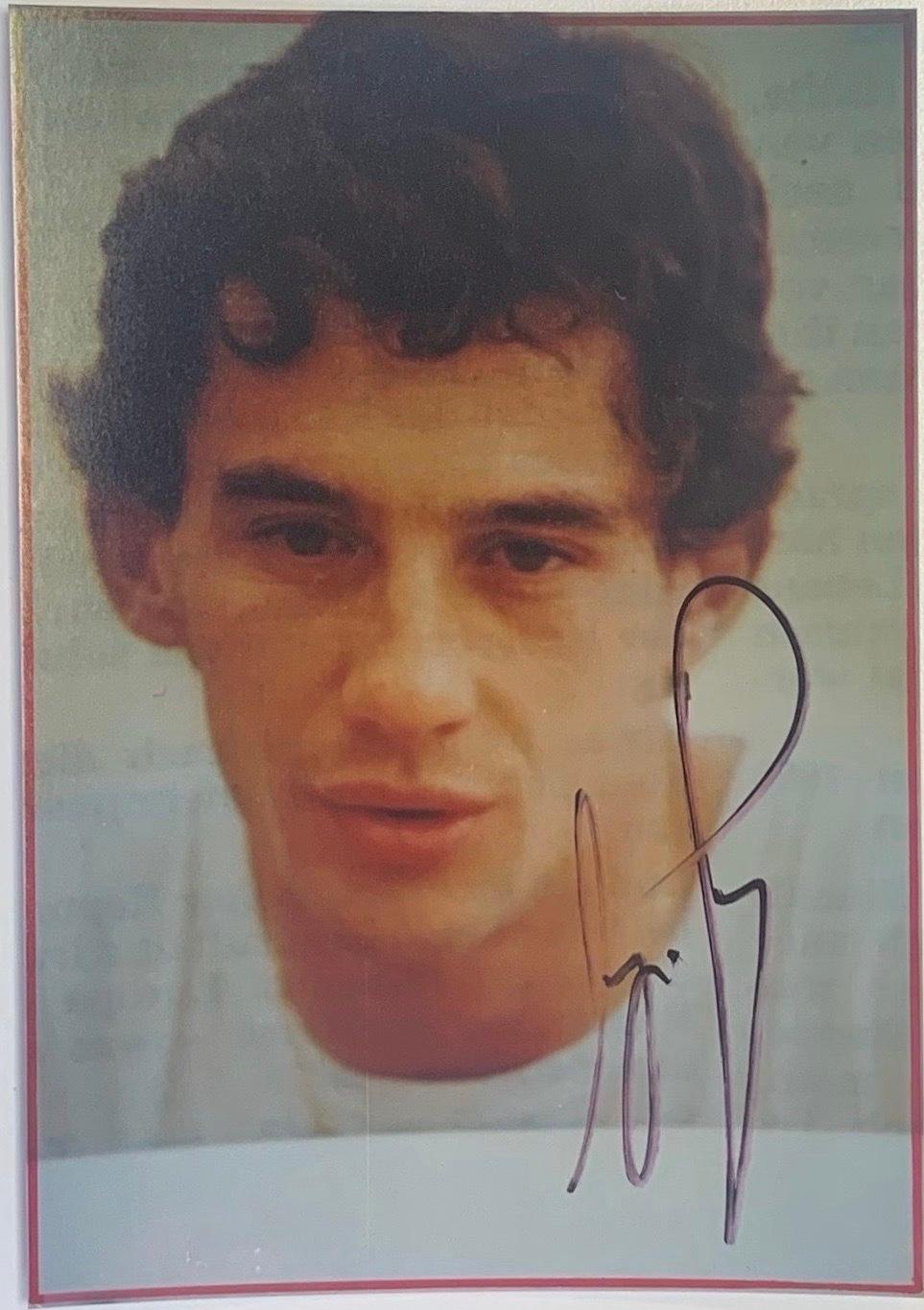 Ayrton Senna signed photograph
A postcard size colour photograph of F1 motor racing champion Ayrton Senna.

Autographed across the lower right corner of the image in bold black ink.

An excellent example of a rare and highly sought after