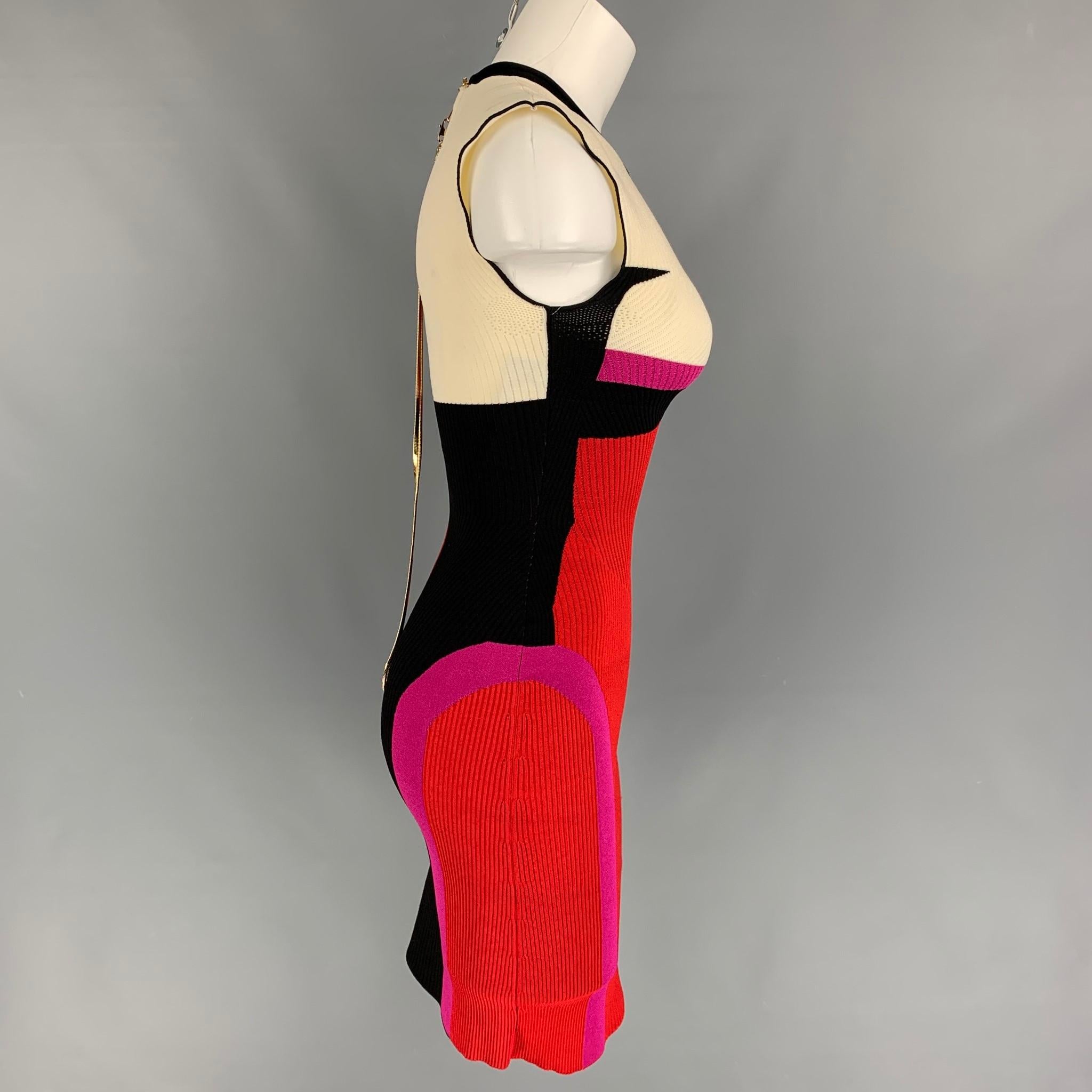 AZ FACTORY dress comes in a multi-color viscose blend featuring a color block style, sleeveless, gold tone hardware, crew-neck, detachable chain strap, and a back full zip up closure. 

Good Pre-Owned Condition. Light discoloration at back.
Marked:
