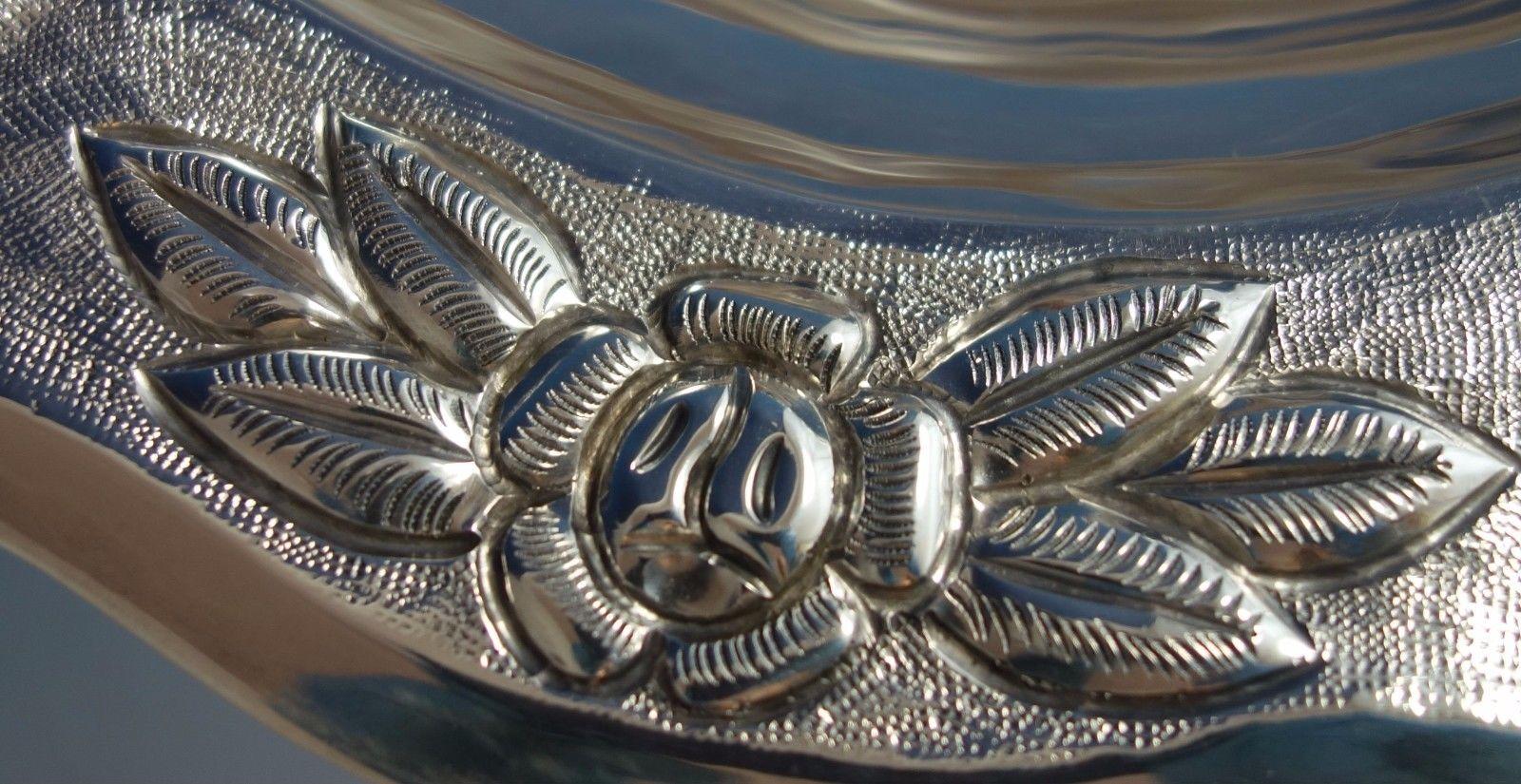 Aztec Rose by Maciel
Stunning Aztec Rose by Maciel sterling silver fruit bowl. This dish is not monogrammed and features a beautiful border of flowers. It is marked Maciel #6522 and #5. This piece measures 1 3/4
