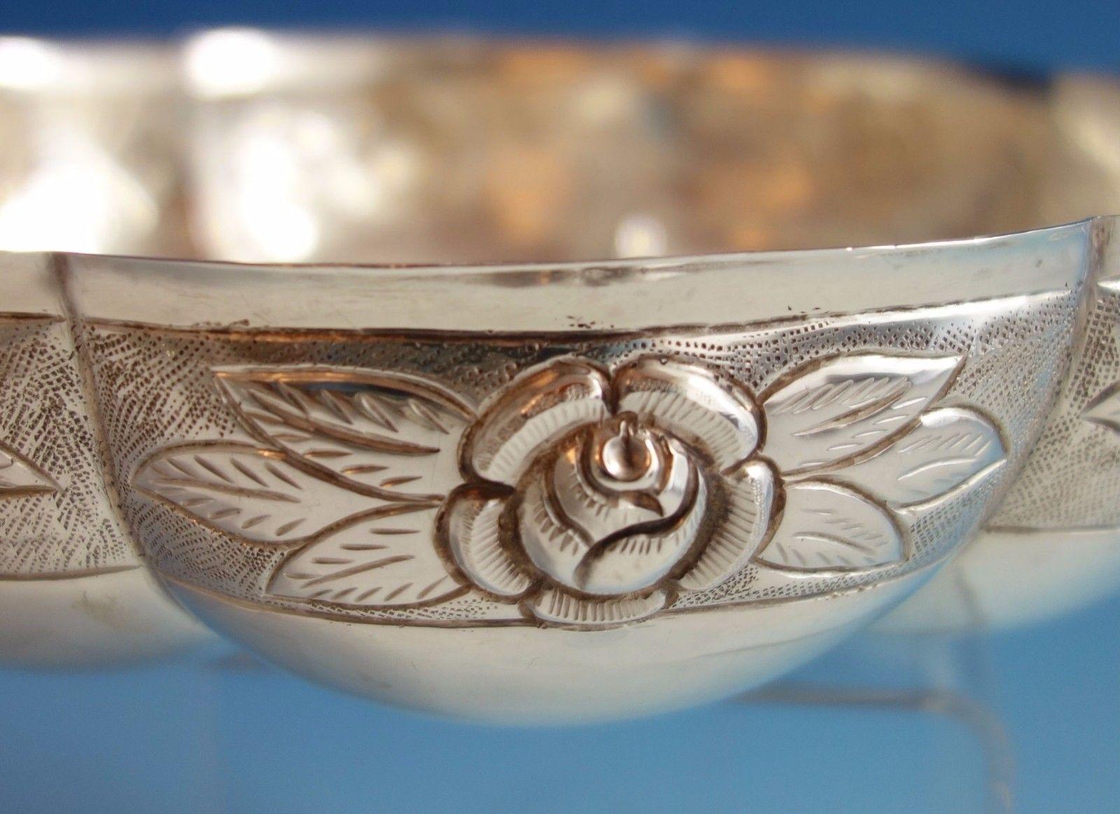 Aztec Rose by Sanborns
Stunning Aztec Rose by Sanborns sterling silver bowl with two rose handles. It is marked Sanborns Mexico and weighs 15.1 ozt. This piece measures 2 1/8