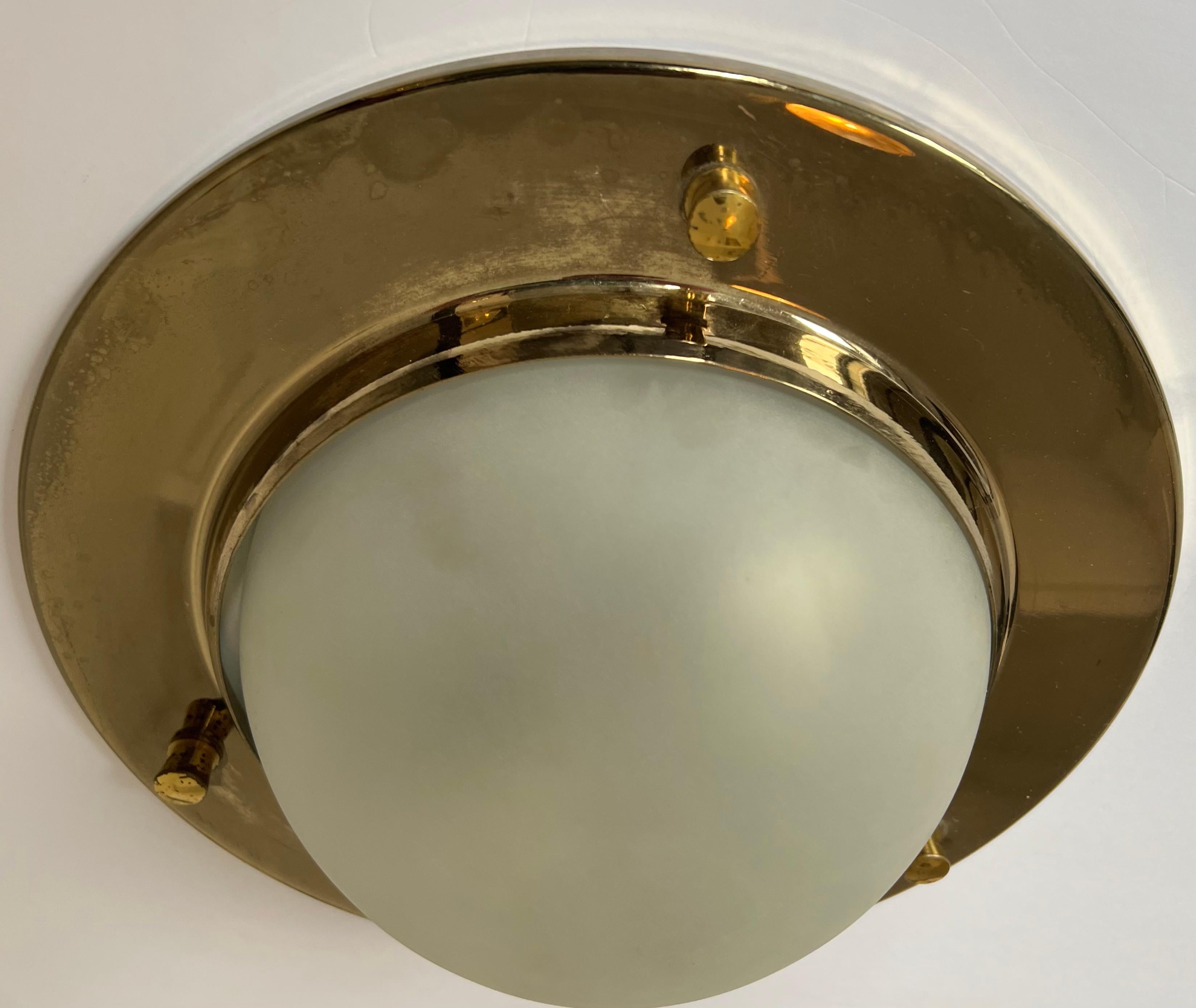 A 1960s Italian nautical style ceiling light in polished brass with a white glass shade. Rewired. Made by Azucena.
