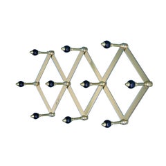 Azucena Coat Hanger in Brass with Lacquerd Wooden Knobs