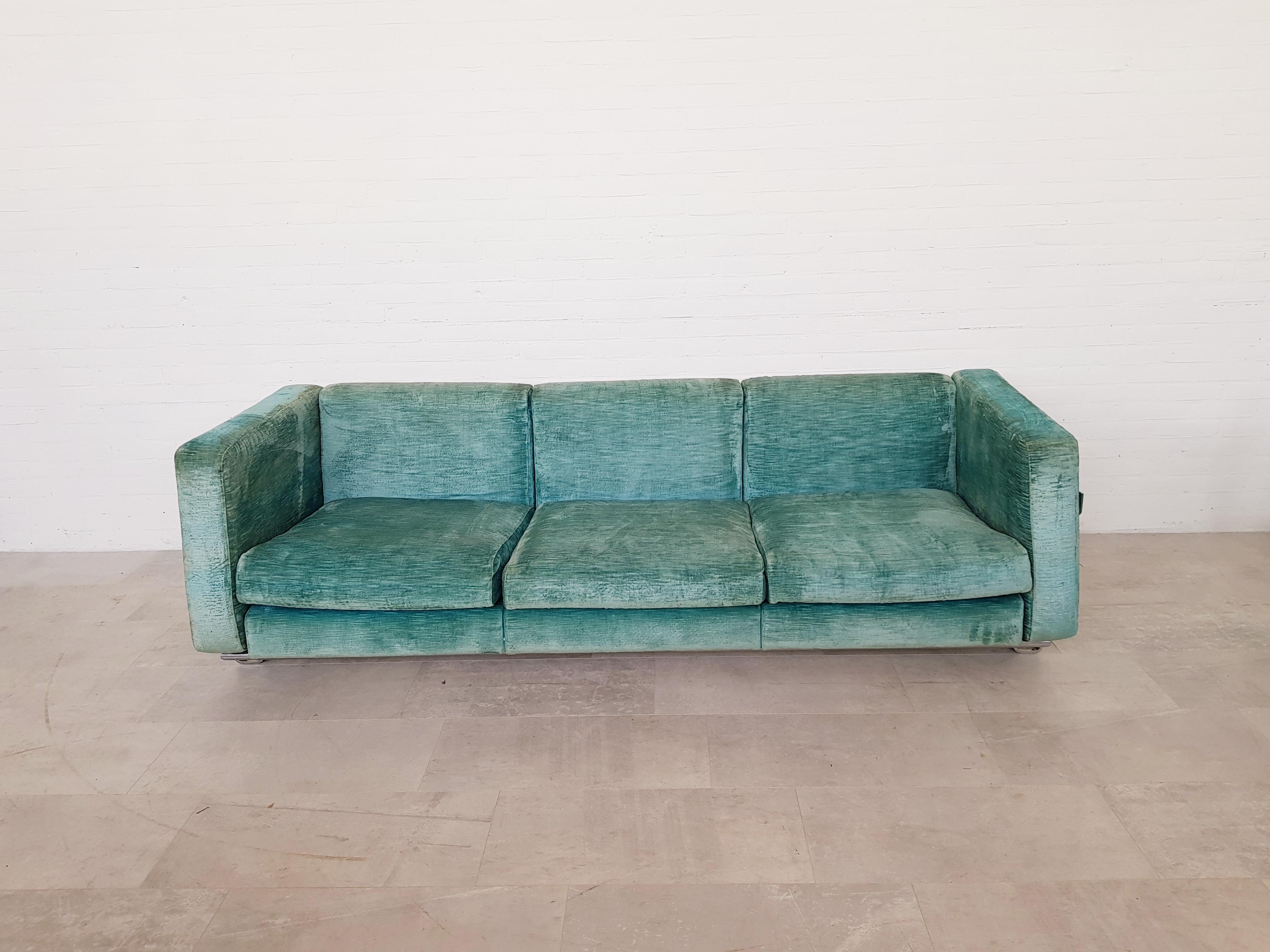 Turquoise vintage sofa by Luigi Caccia Dominioni for Azucena, Italy, 1970s.

Stunning wear on the turquoise fabric which I personally adore, very studio Dimore.
Worn fabric on a perfect condition chromed steel frame

Postmodern three-seat
We