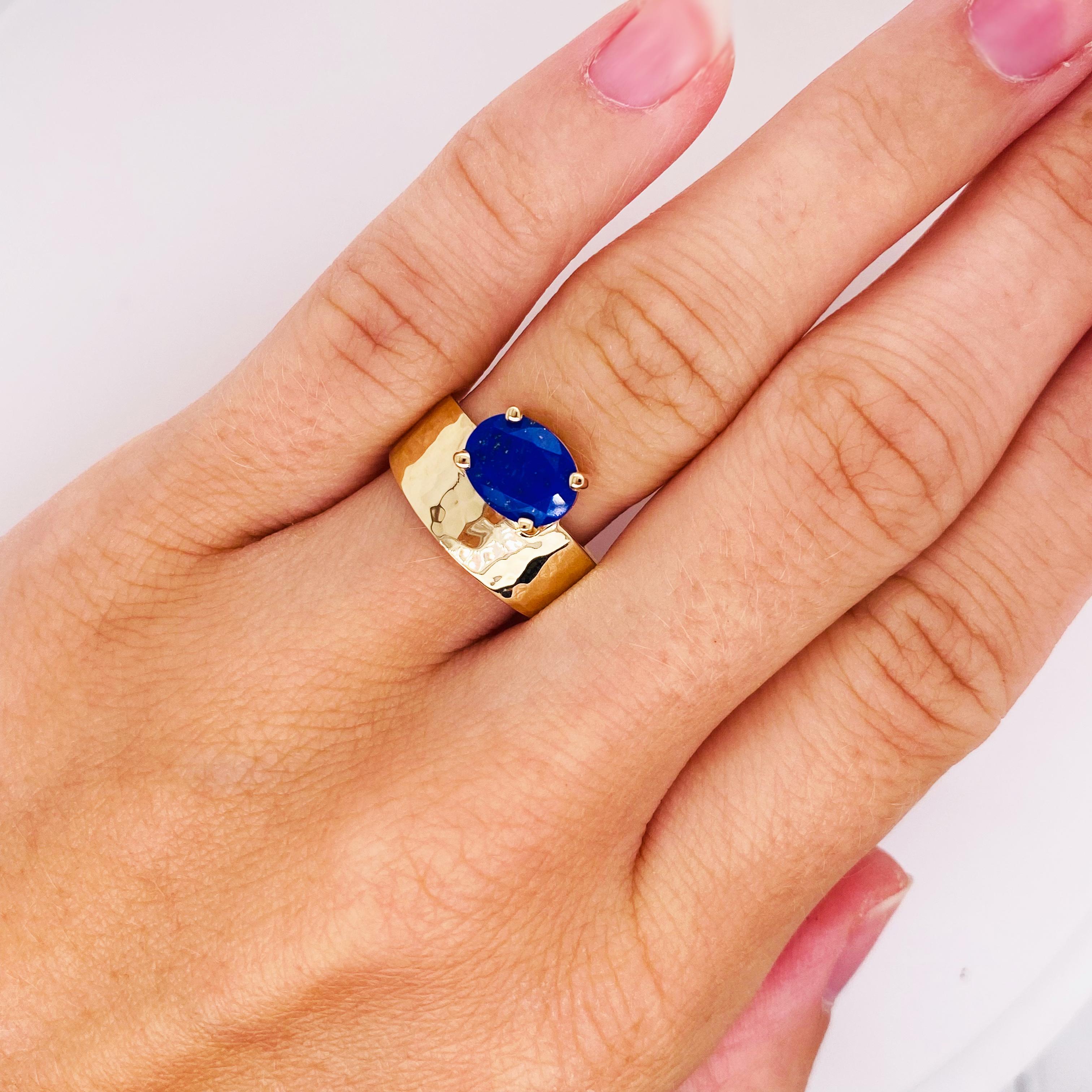 “Azul” is this magnificent blue lapis lazuli ring that was designed by Mary Rupert of Five Star Jewelry in Austin, Texas. She has made a hammered 14 karat yellow gold band  that is iconic with an oval blue lapis lazuli that is faceted and oval