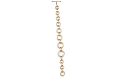 Bracciale Azure Arc Oro con dettagli in oro giallo senza tempo e diamanti brillanti