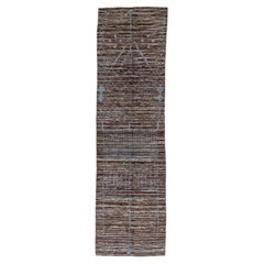 Azurblau auf Rocky Brown mit Village Weavings