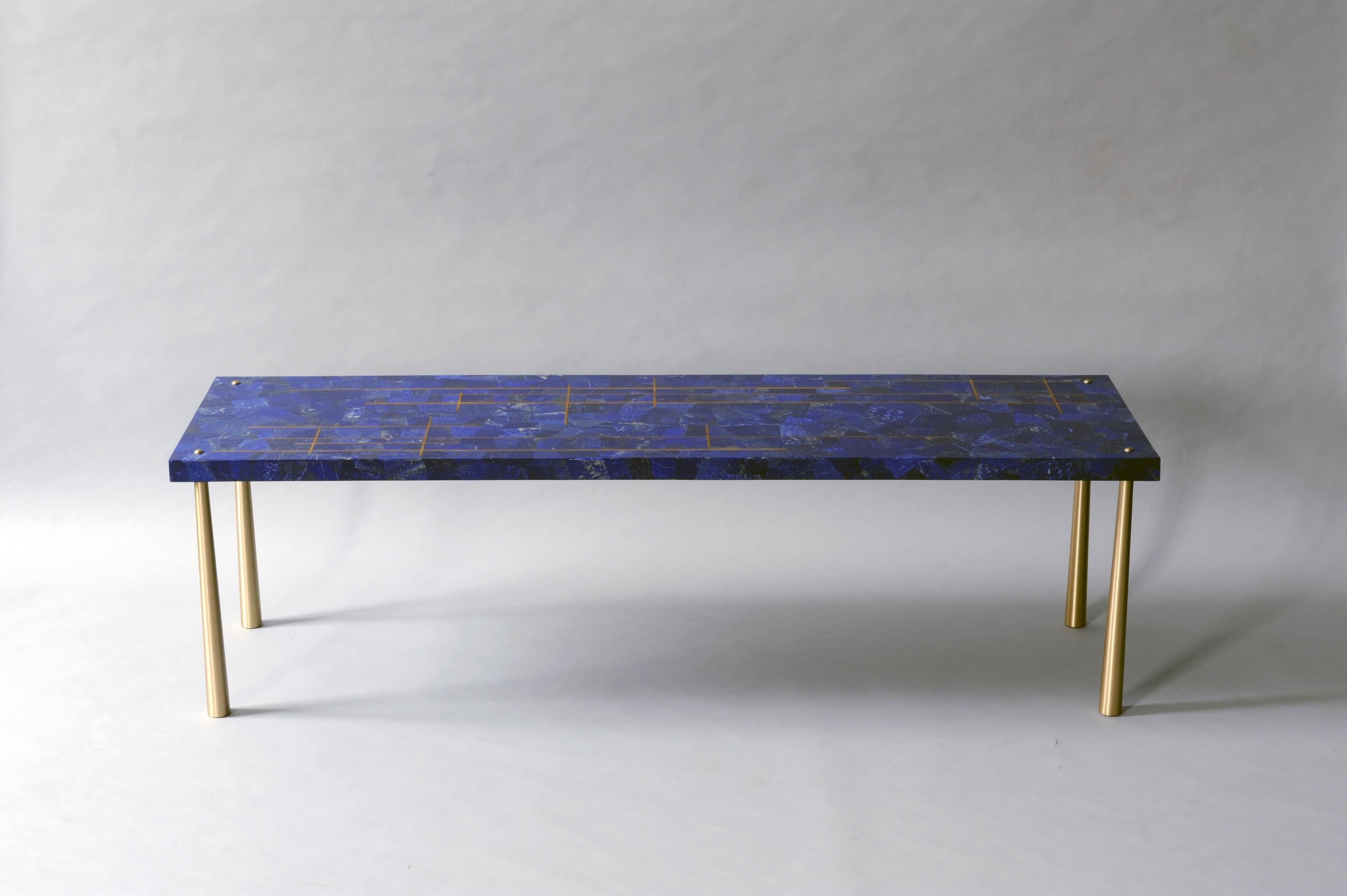 Azure coffee table by DeMuro Das
Dimensions: W 150 x D 45 x H 43.3 cm
Materials: Lacquer (traffic black 9017) - Matte, lapis Lazuli - polished (Random)
 Solid Brass (Satin) Legs

Dimensions and finishes can be customized.

DeMuro Das is an