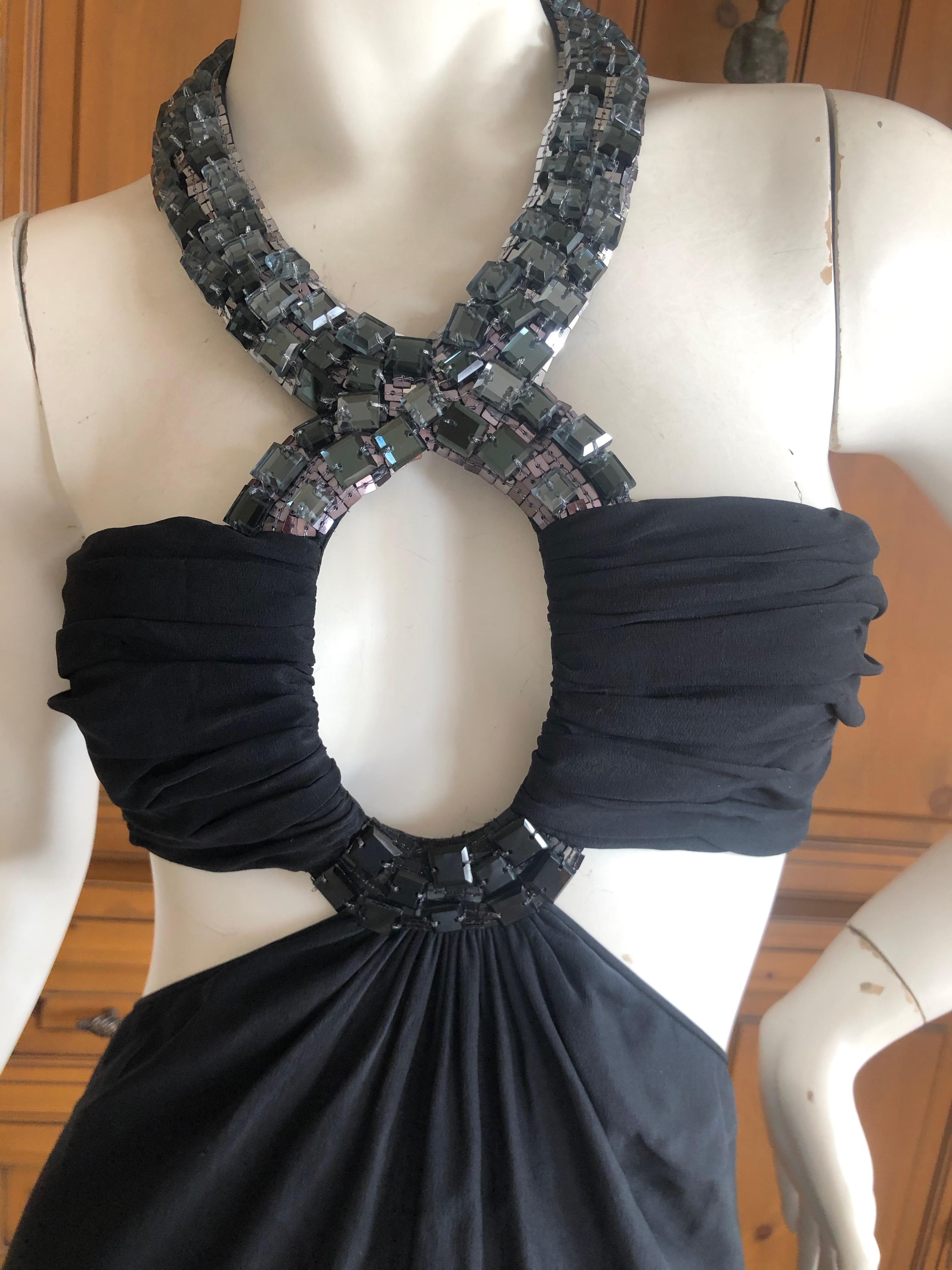 Exquisite Azzaro Black Evening Dress with Bold Crystal Jewel Details
This is so amazing, much prettier than the photos show. 
Huge swags of crystals adorn this beautiful piece , a real showstopper.
Size 36, this is pretty tiny in the bust.
Bust 32