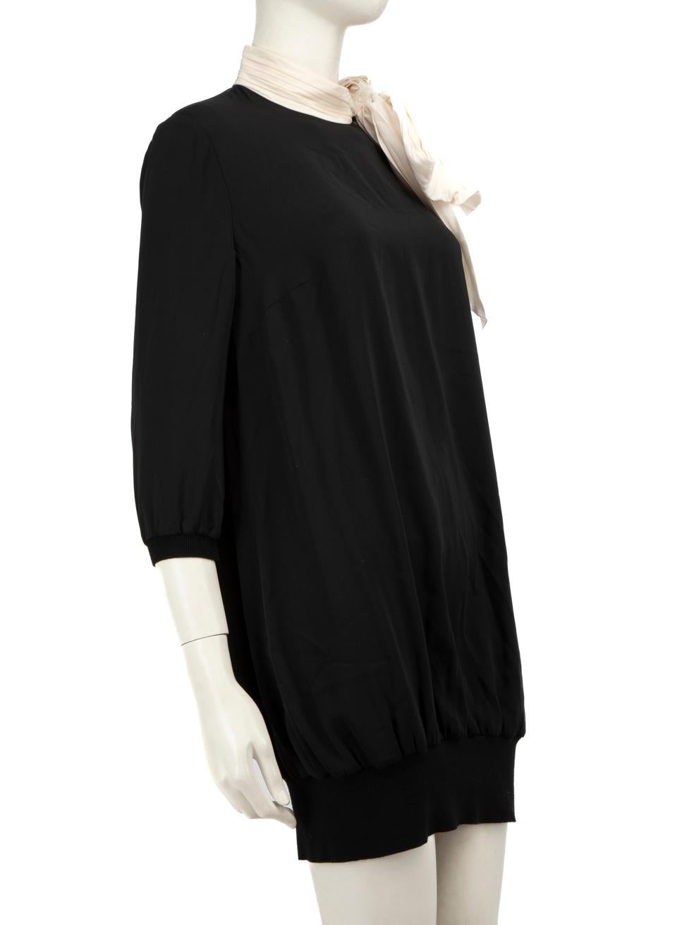 CONDITION is Very good. Hardly any visible wear to dress is evident on this used Azzaro designer resale item.



Details


Black

Silk

Dress

Mini

Long sleeves

Ribbed knit cuffs

Detachable bow on the neck

Neck button fastening





Made in