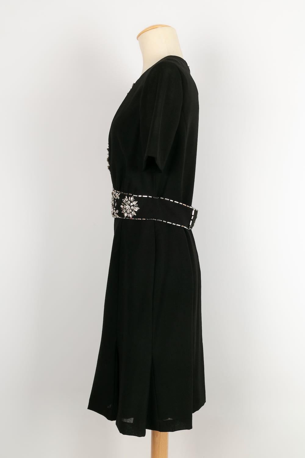 Azzaro -(Made in France) Dress embroidered with rhinestones and black satin lining. Size indicated 40FR, it corresponds to a 38FR.

Additional information: 
Dimensions: Shoulder width: 36 cm, Chest: 38 cm, Waist: 35 cm, Hips: 44 cm, Sleeve length: