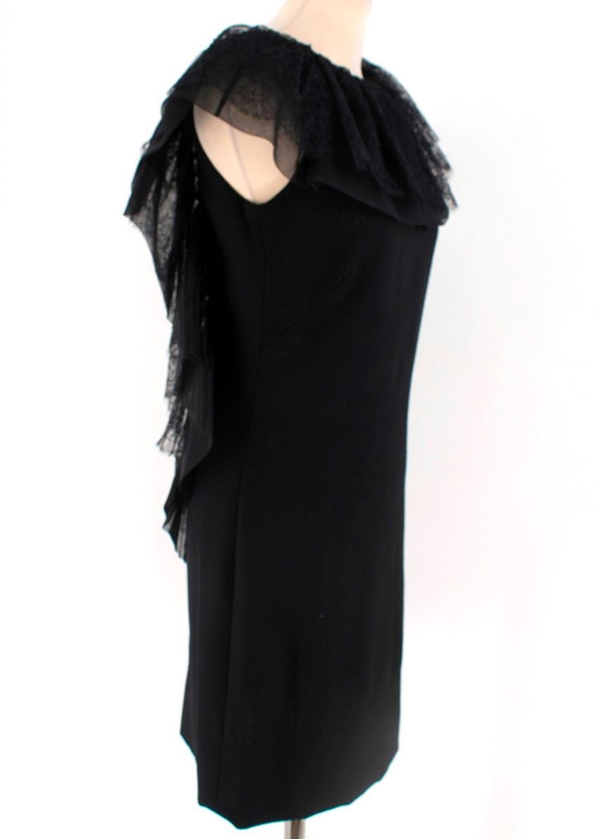Azzaro 'Gazette' black wool dress with low V-shaped back. This dress features large chiffon, silk and lace trim, a high round-neck and jewel button fastenings. 


 - Jewel button fastenings through the back 
- 100% wool; chiffon trim: 100% silk;