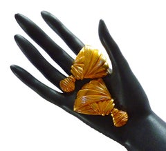 AZZARO PARIS Gold Clip On Earrings from the 1980s