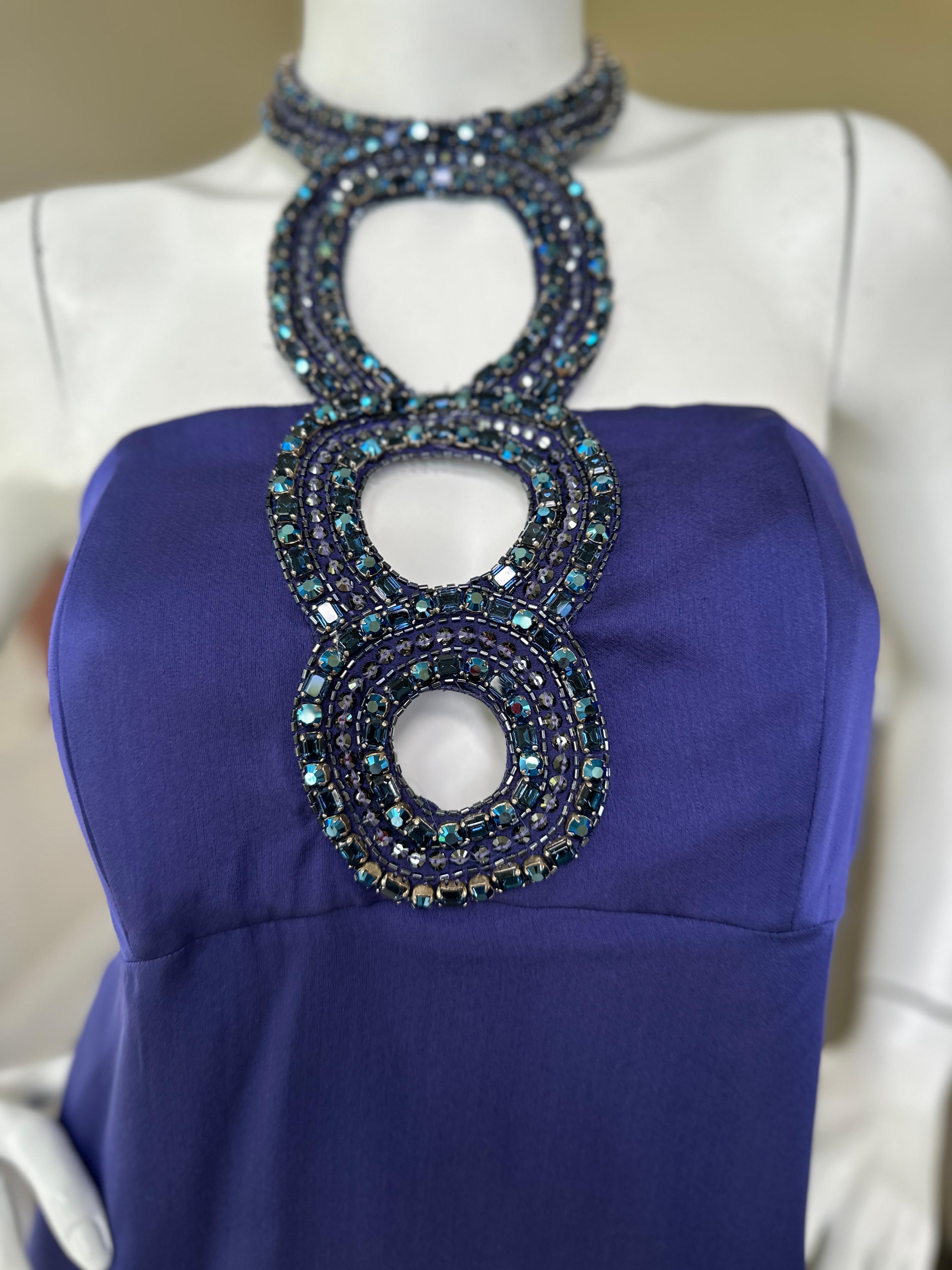 Robe de cocktail en soie bleue Vintage By avec trou de serrure orné de bijoux.

Taille 42
 Buste 34
