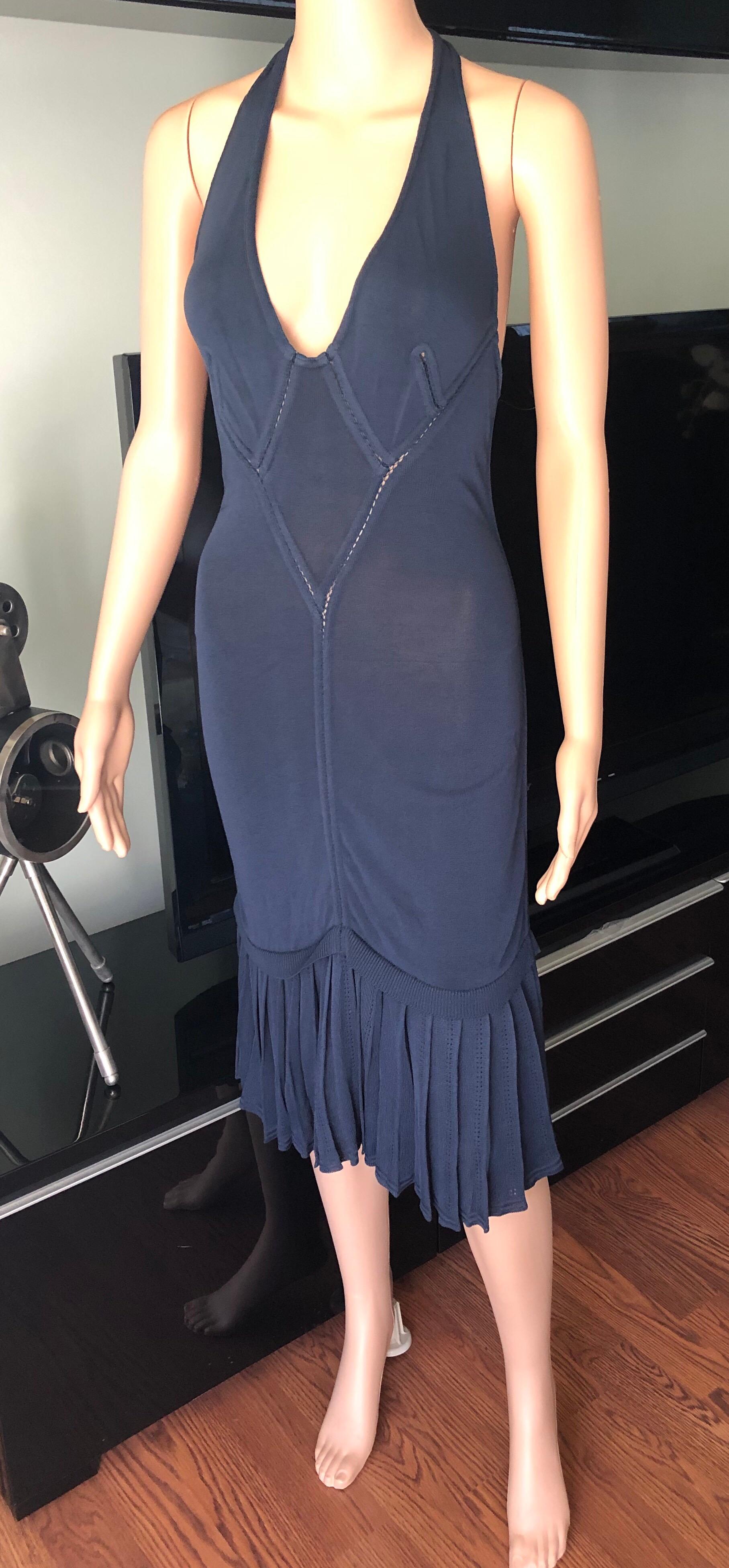Azzedine Alaia Vintage Plunging Semi-Sheer Midi Dress Size XS

Vintage Alaia sleeveless midi dress with open knit trim throughout, plunging neckline and flared hem.