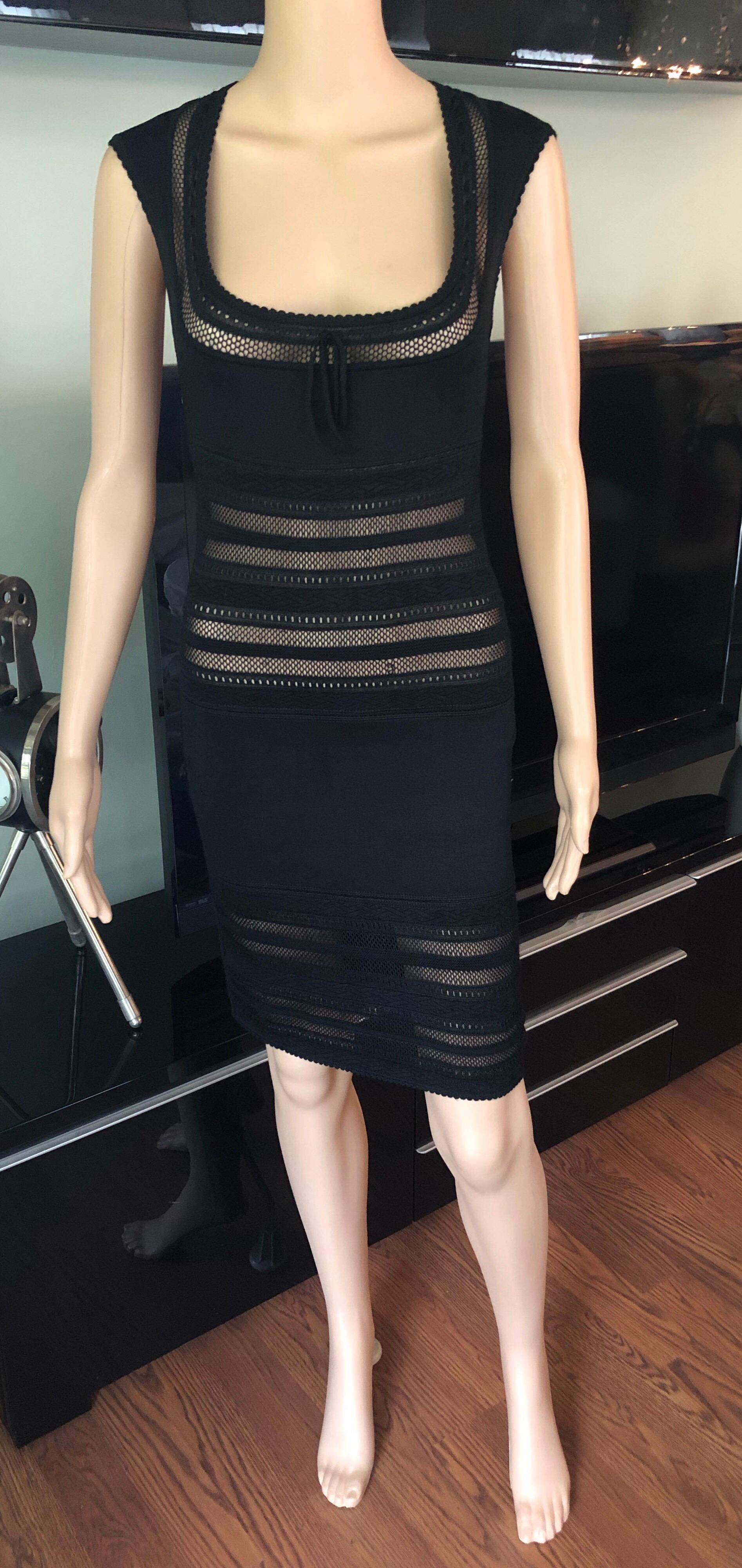 Azzedine Alaia 1990's Vintage Fitted Semi-Sheer Bodycon Black  Dress Size XS

Alaïa sleeveless bodycon mini dress with open knit paneling throughout, scoop neck featuring tonal bow accent at collar, scalloped trim and concealed zip closure at center