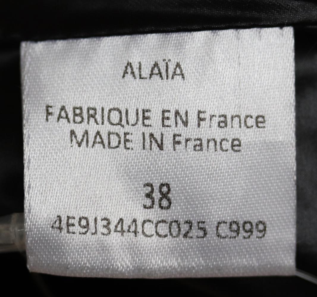 Black Azzedine Alaïa Asymmetric Eyelet Embellished Leather Mini Skirt