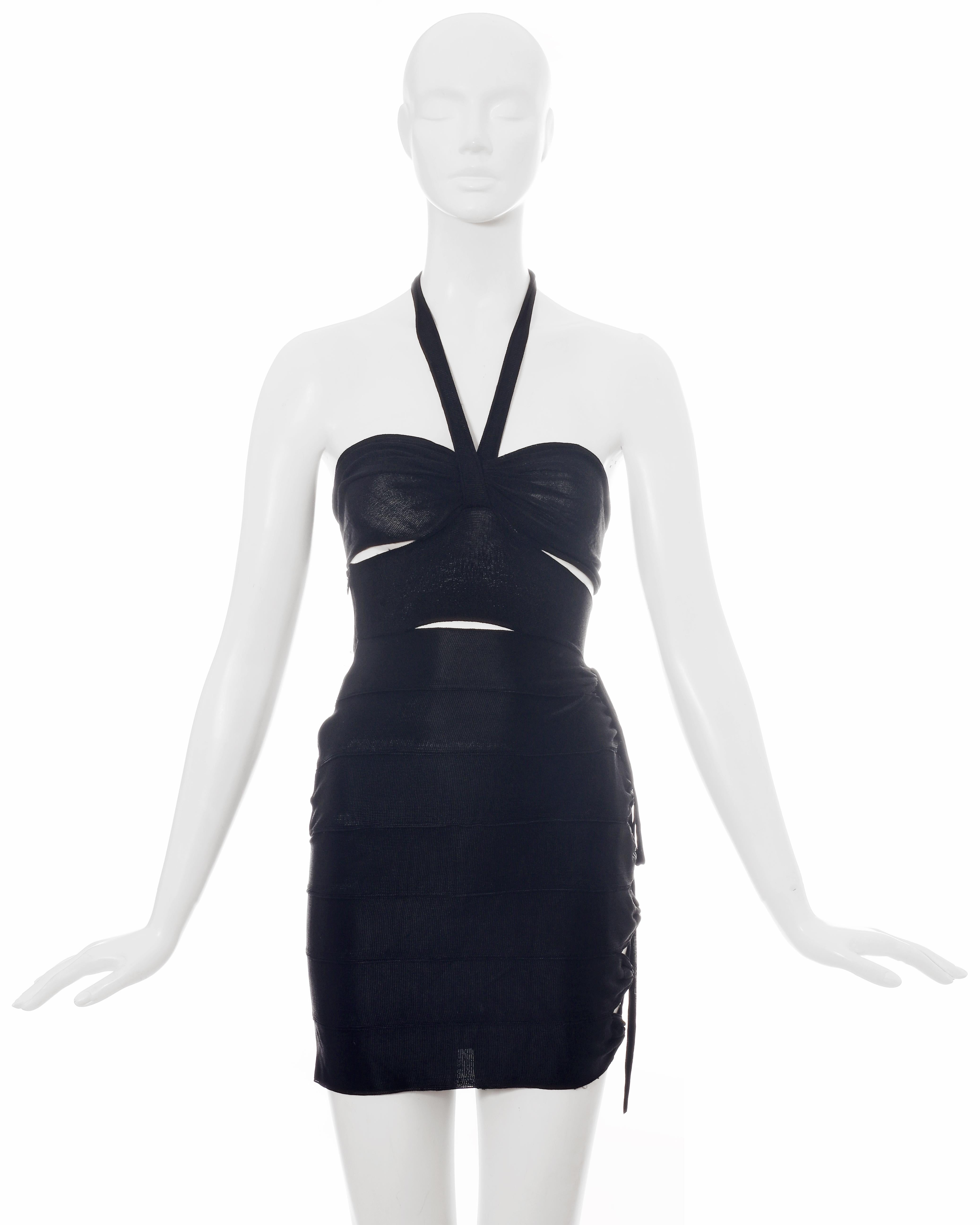 Azzedine Alaia black acetate halter-neck mini dress: fitted skirt made from multiple horizontal panels with lace up fastening, attached bra top with hook fastening at centre-back. 

Spring-Summer 1986