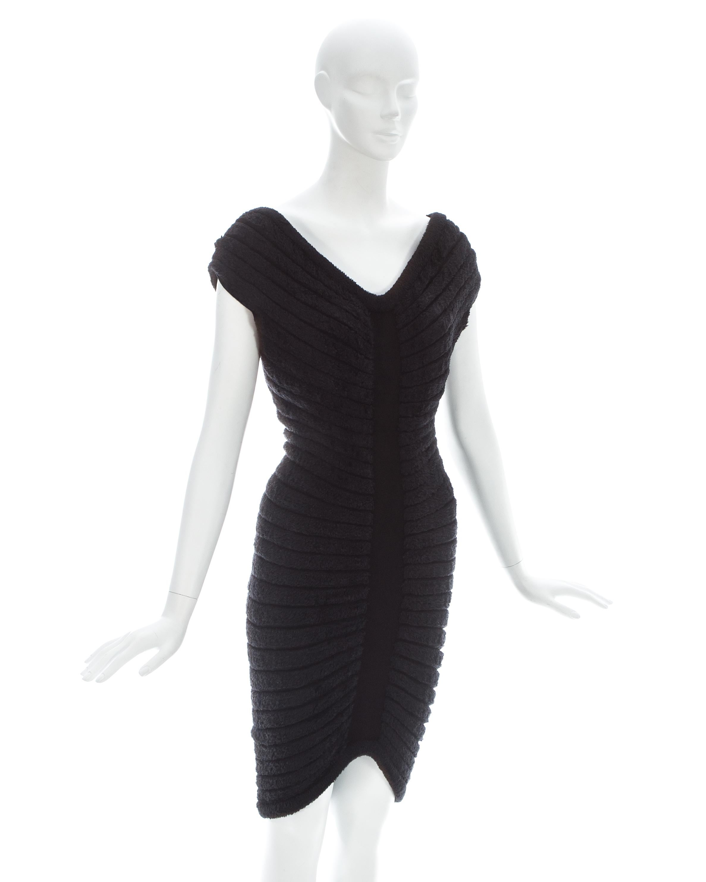 Azzedine Alaia; Black chenille-knitted figure-hugging 'Houpette' dress with radiating concentric chenille bands

Spring-Summer 1994
