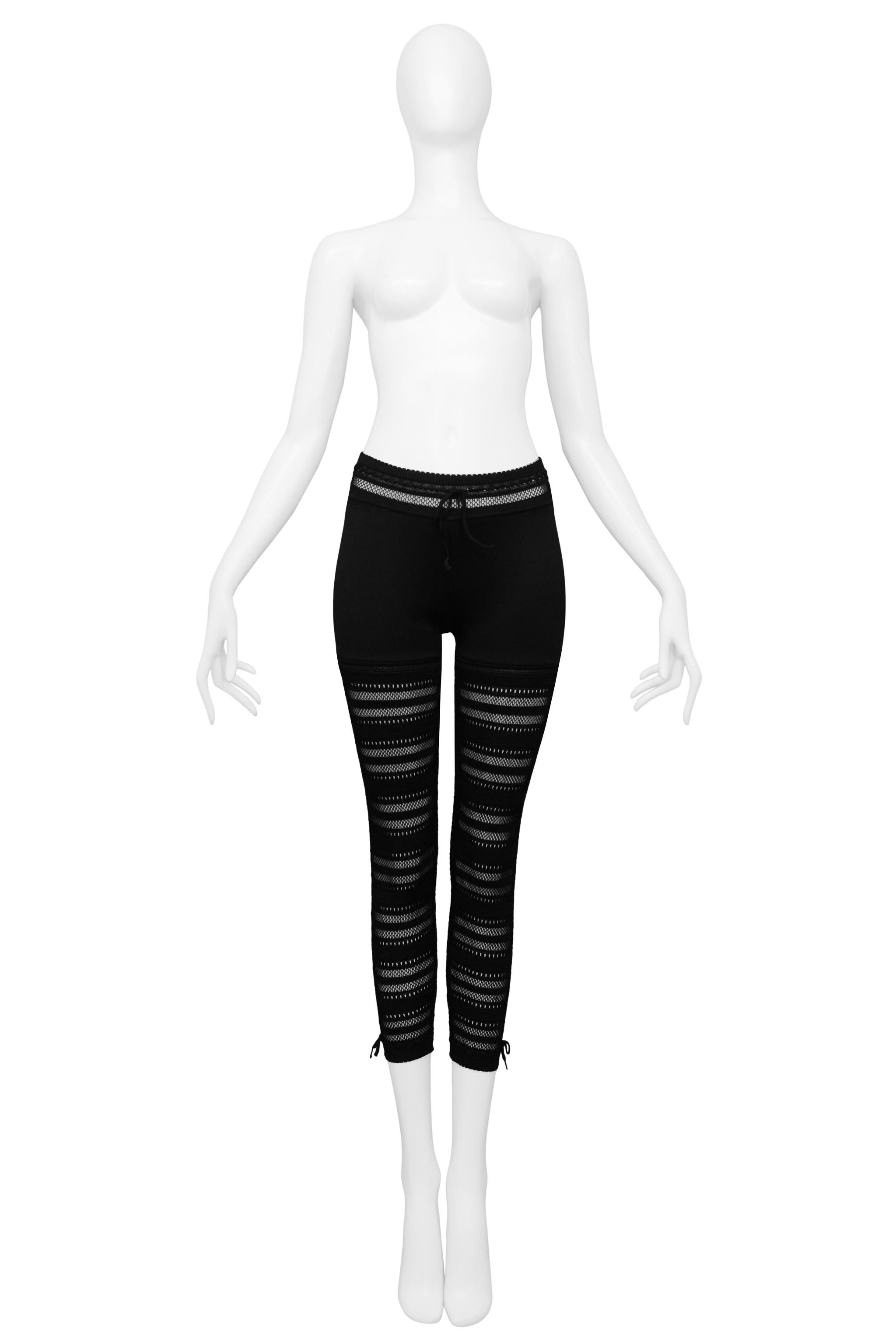 Resurrection Vintage is excited to offer a pair of vintage Azzedine Alaia black knit leggings featuring a drawstring waist, bike-short panel, crochet panels, and drawstrings at the ankles. 

Azzedine Alaia Paris
Size XS (Today's size 2-4)
Rayon