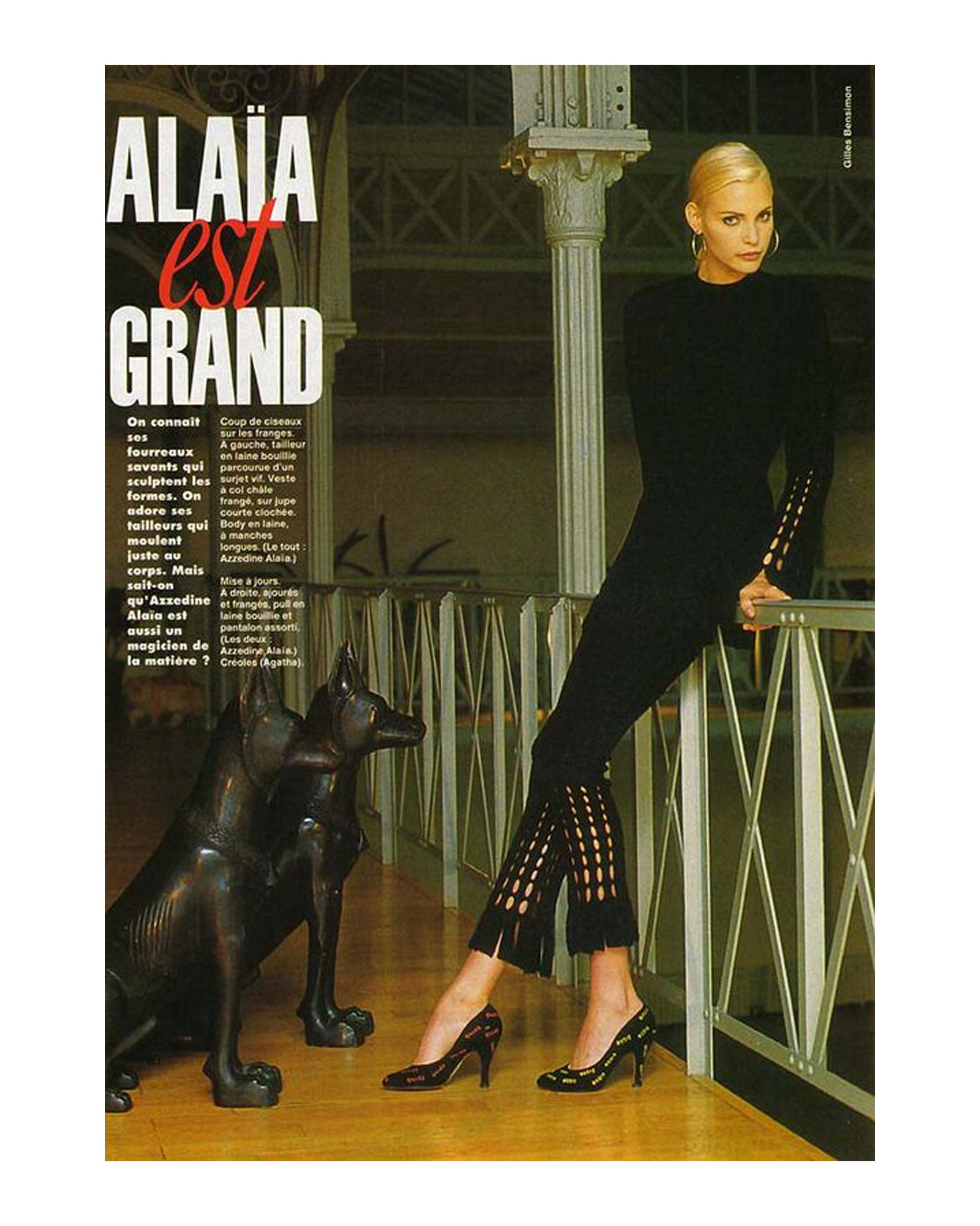 Azzedine Alaia black laser cut boiled wool fringed pant suit.  Micro mini dress with flared sleeves and fitted high waisted pants with fringed hem. 

Fall-Winter 1993
