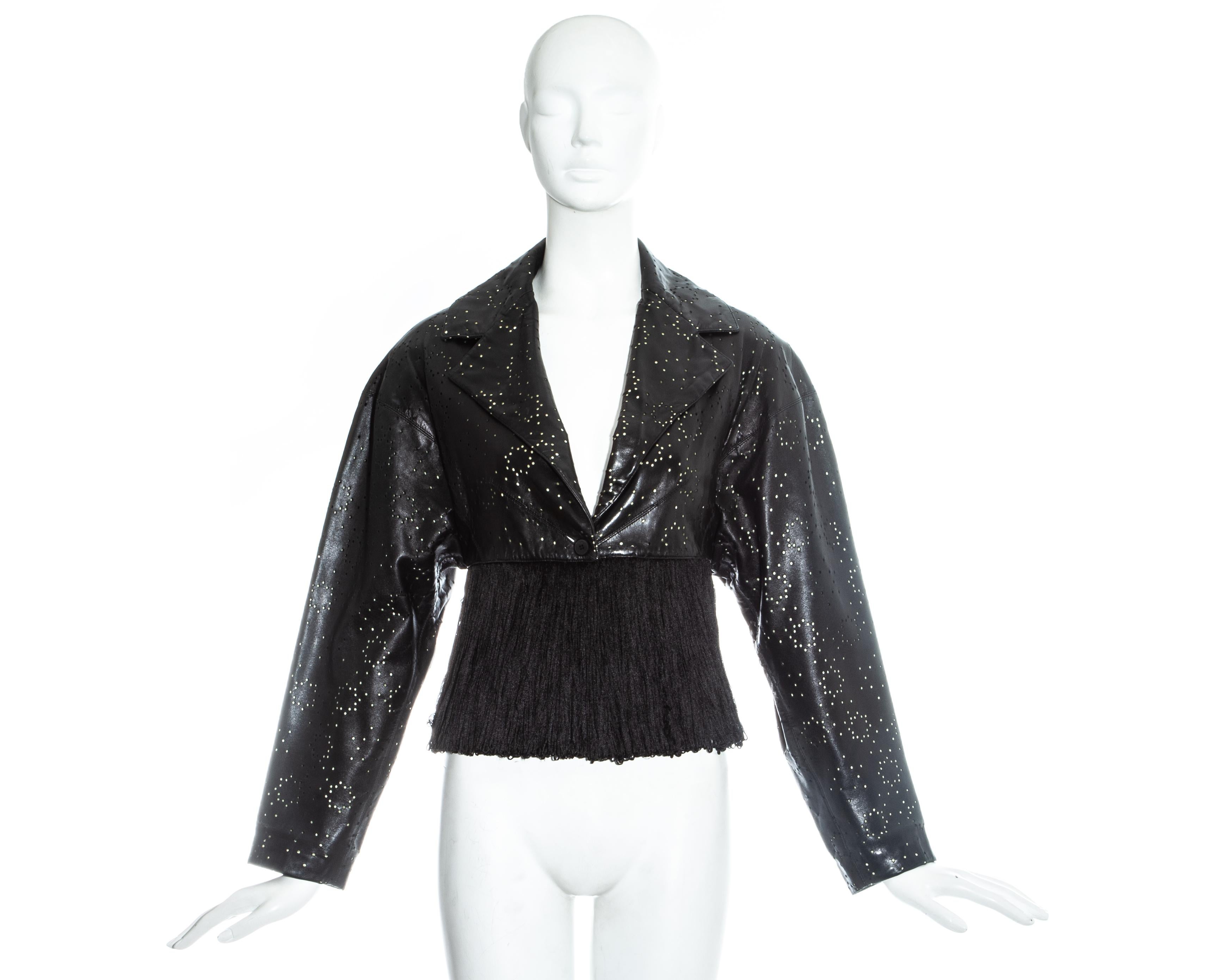 Azzedine Alaia; black laser cut leather jacket fringed with silk ribbon. 

Spring-Summer 1988

