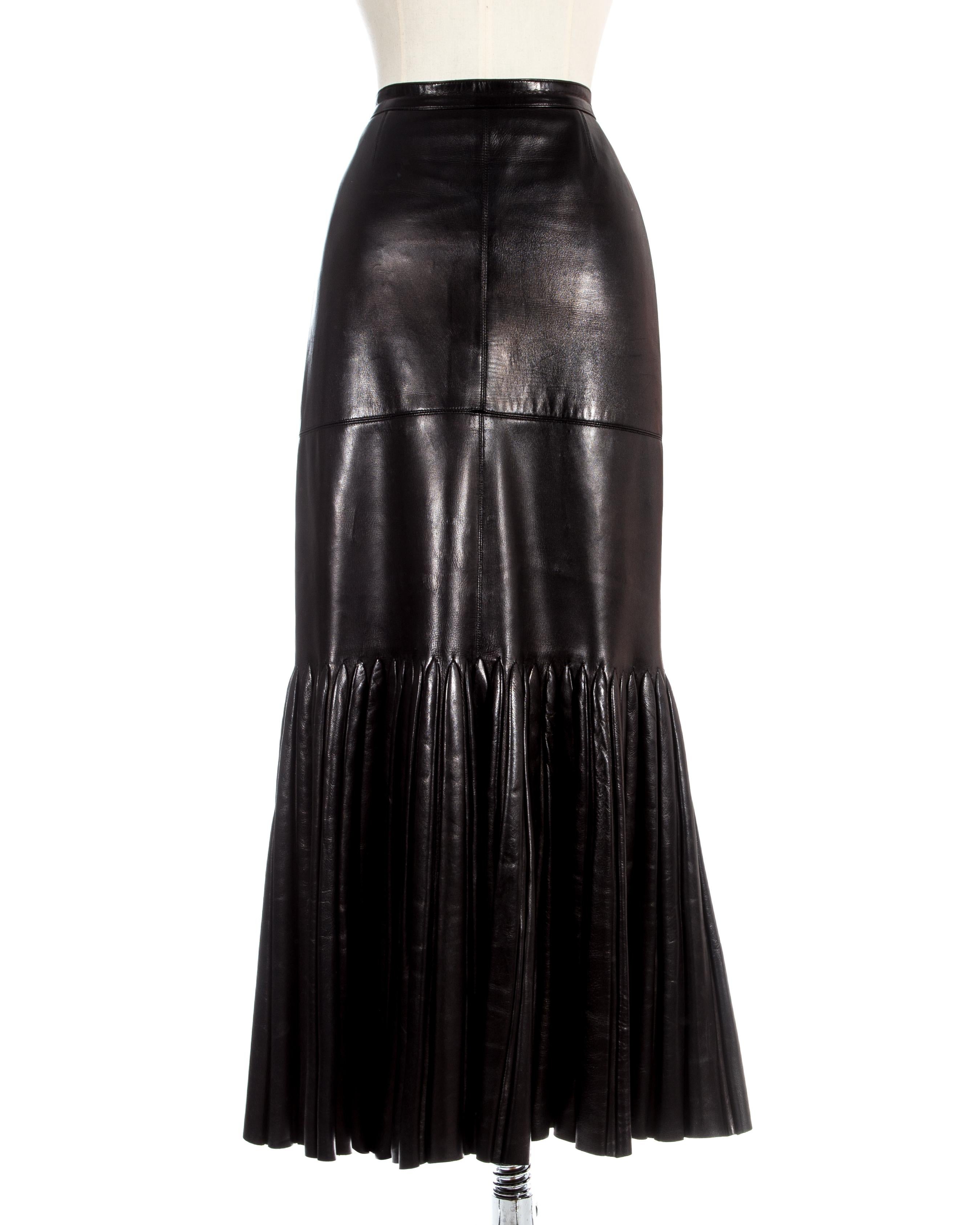 Azzedine Alaia; black leather skirt, pencil-slim, of softest calf leather, with multi-gored pleated 'mermaid' hem. 

c. 1999
