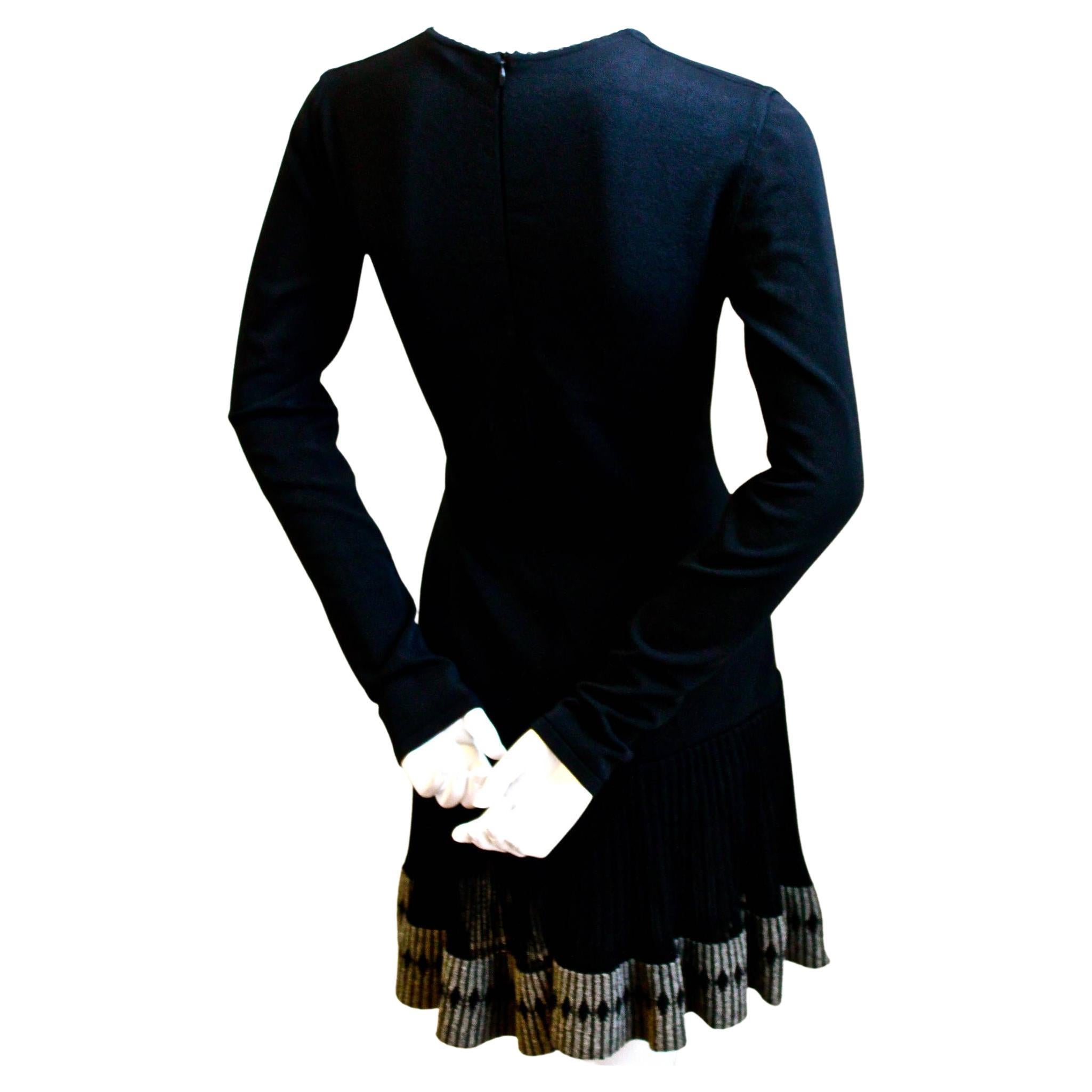 AZZEDINE ALAIA black mini dress with ruffled hemline In Good Condition For Sale In San Fransisco, CA