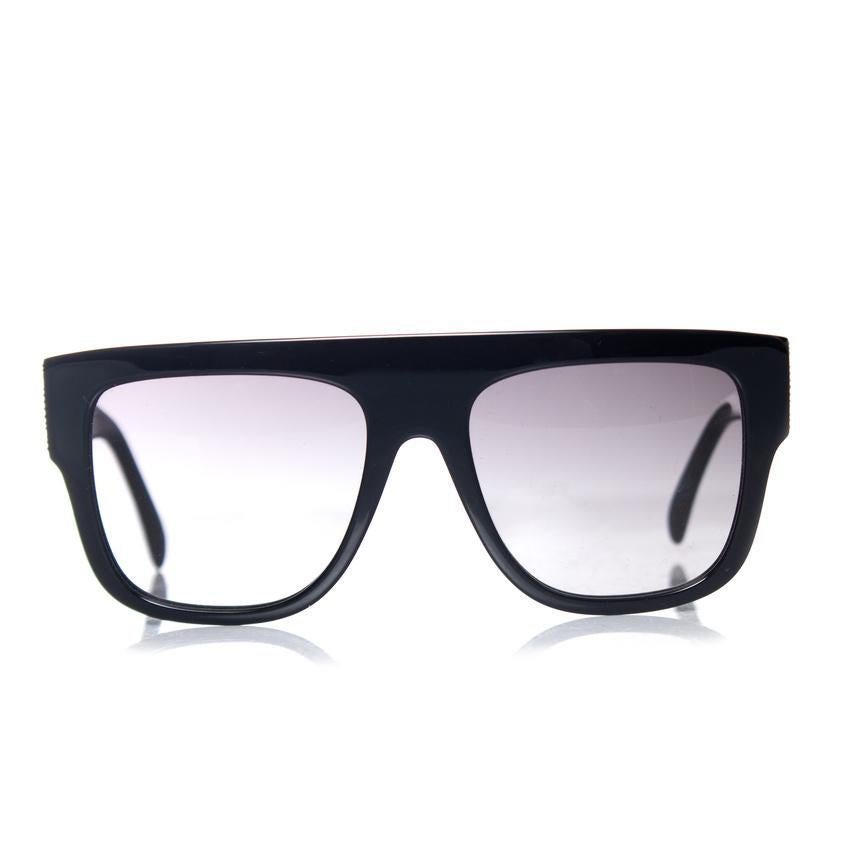 Azzedine Alaia, Black rectangular gradient sunglasses with embellished temples. This item is new - unworn.

• CONDITION: new - unworn 

• CODE: AA0010S

• MEASUREMENTS: height lens 5.5 cm, width lens 7 cm, width frame 14 cm

• MATERIAL: plastic 

•