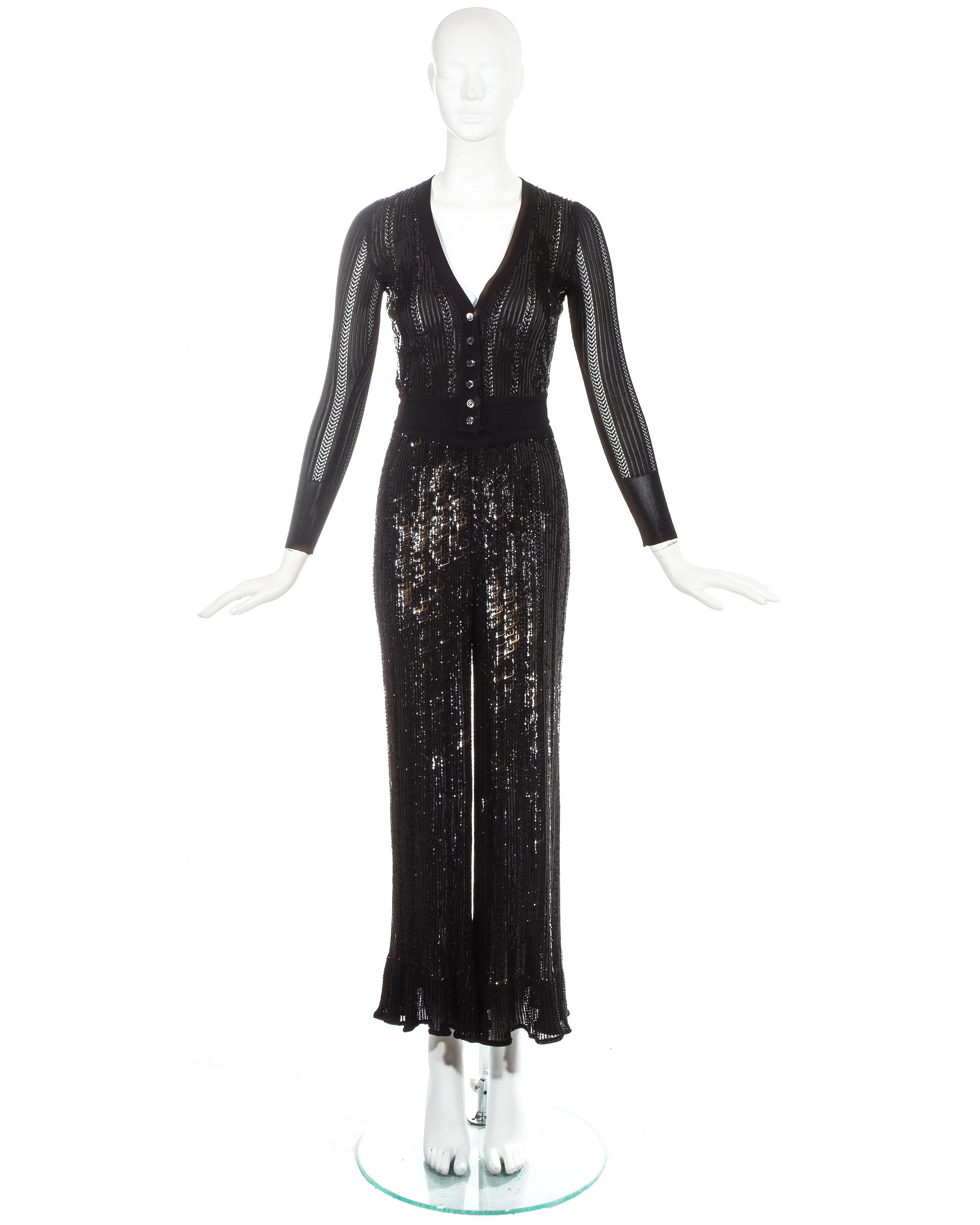 Azzedine Alaia black sequin and beaded 3-piece pant suit

- Fitted cardigan 
- High waisted flared pants 
- Additional matching bodysuit (not pictured) 

Spring-Summer 1996