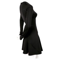 Azzedine Alaia black skater dress with v-neckline and long sleeves, 1990s
