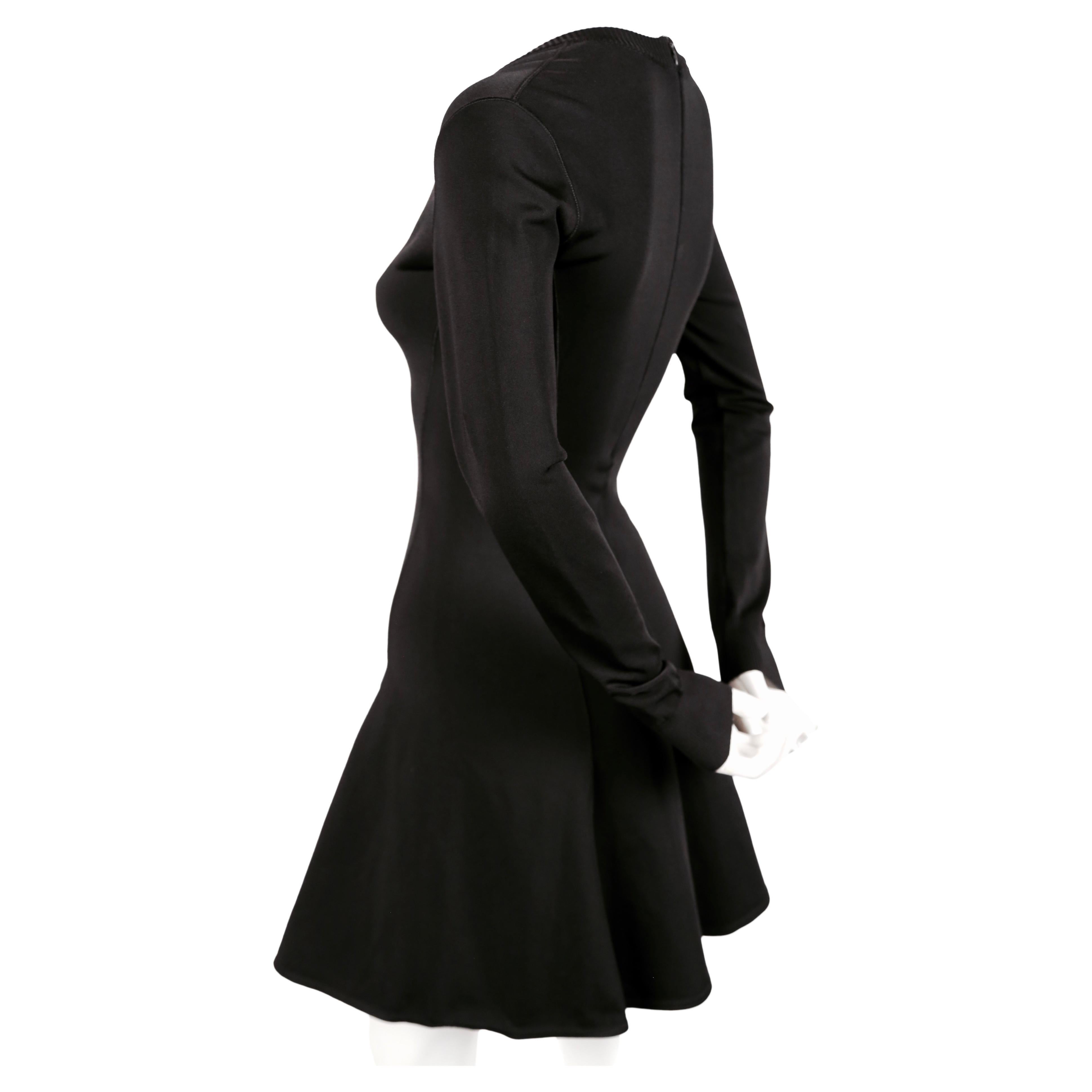 Azzedine Alaia black skater dress with v-neckline and long sleeves, 1990s  In Good Condition For Sale In San Fransisco, CA