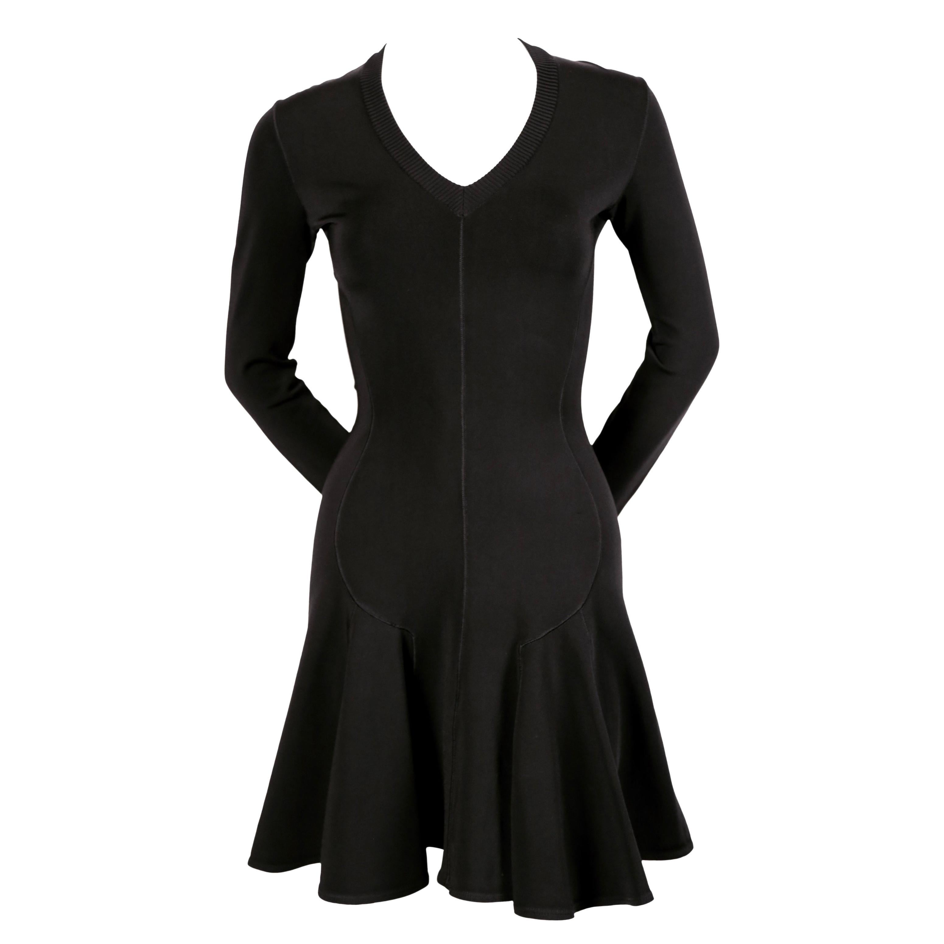 Azzedine Alaia black skater dress with v-neckline and long sleeves, 1990s  For Sale