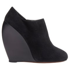 AZZEDINE ALAIA black suede curved wedge round toe ankle bootie EU37