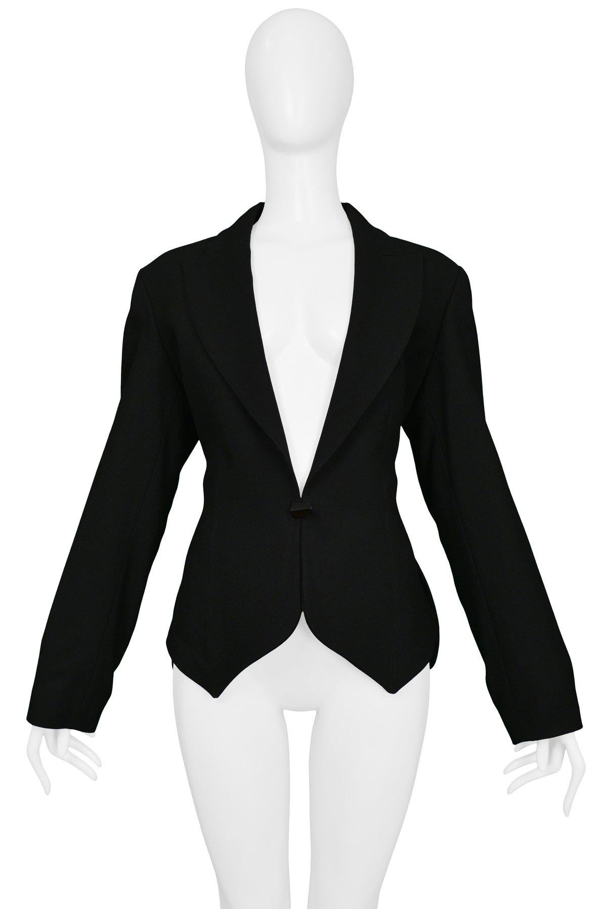 Resurrection Vintage is excited to offer a vintage Alaia black fitted wool blazer featuring a fitted body, notch collar, single-button closure, and pointed front hemline. 

Alaia Label
Size 42
Measurements: Bust 34.5