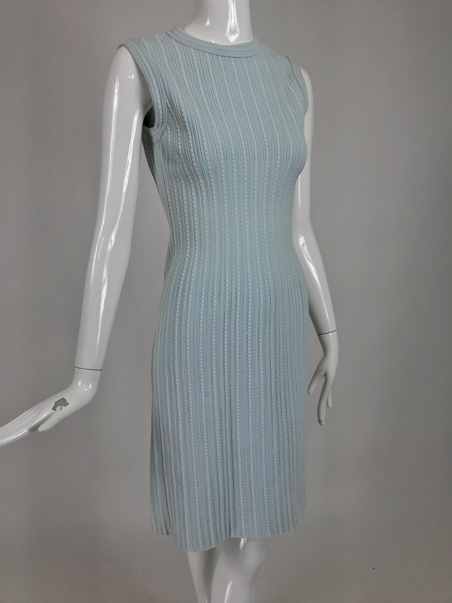 Azzedine Alaïa robins egg blue and cream fitted stretch body con dress. Raised textured stretch viscose sleeveless dress has a jewel neckline, the neck and arm openings are done in self bands of fabric. The dress is fitted and body hugging. Has the
