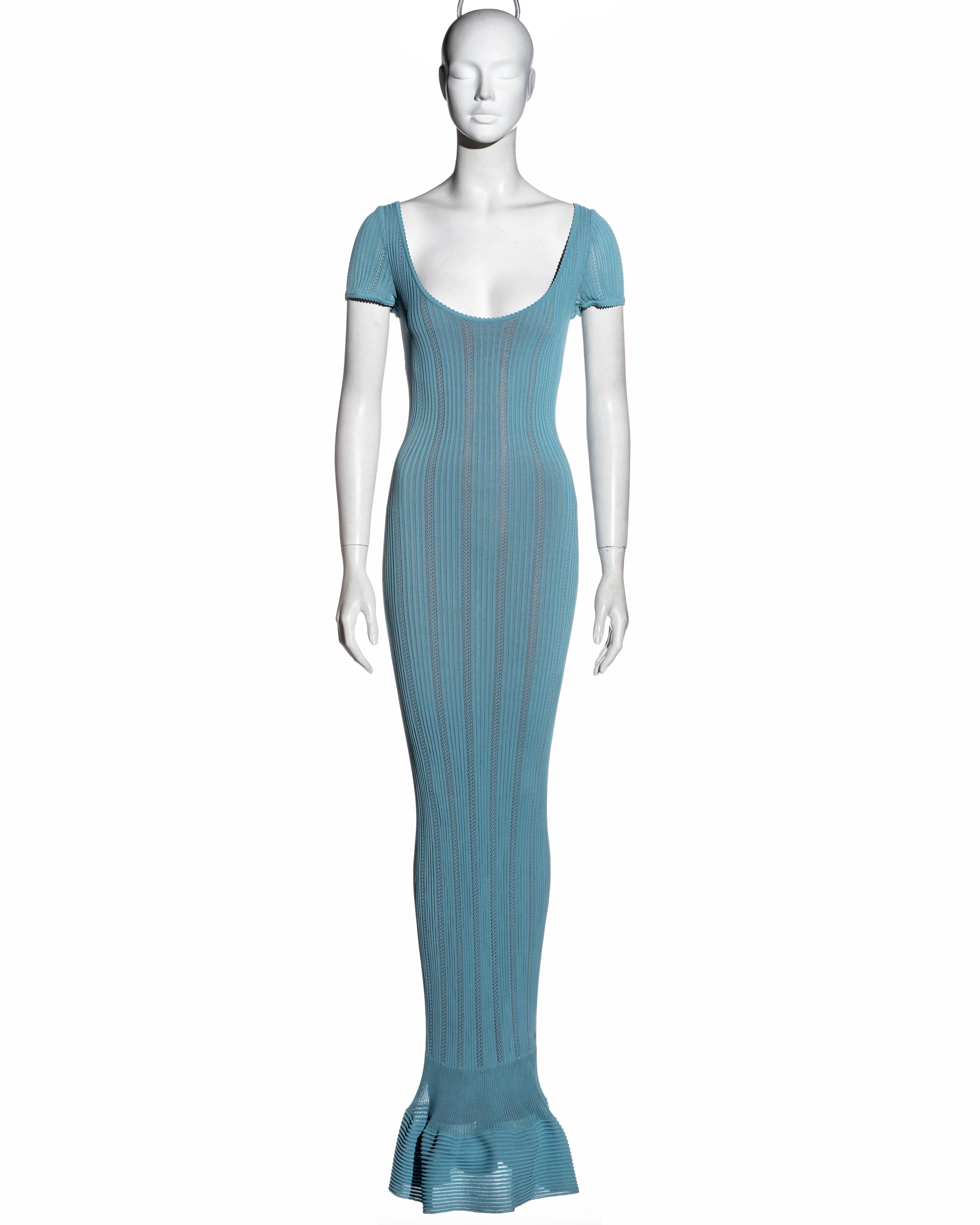▪ Azzedine Alaia blue rayon floor-length dress
▪ Stretch open-knit 
▪ Fishtail skirt 
▪ Figure hugging fit 
▪ Nude lining 
▪ Size 'S'
▪ Spring-Summer 1996
▪ 100% Rayon
▪ Made in Italy