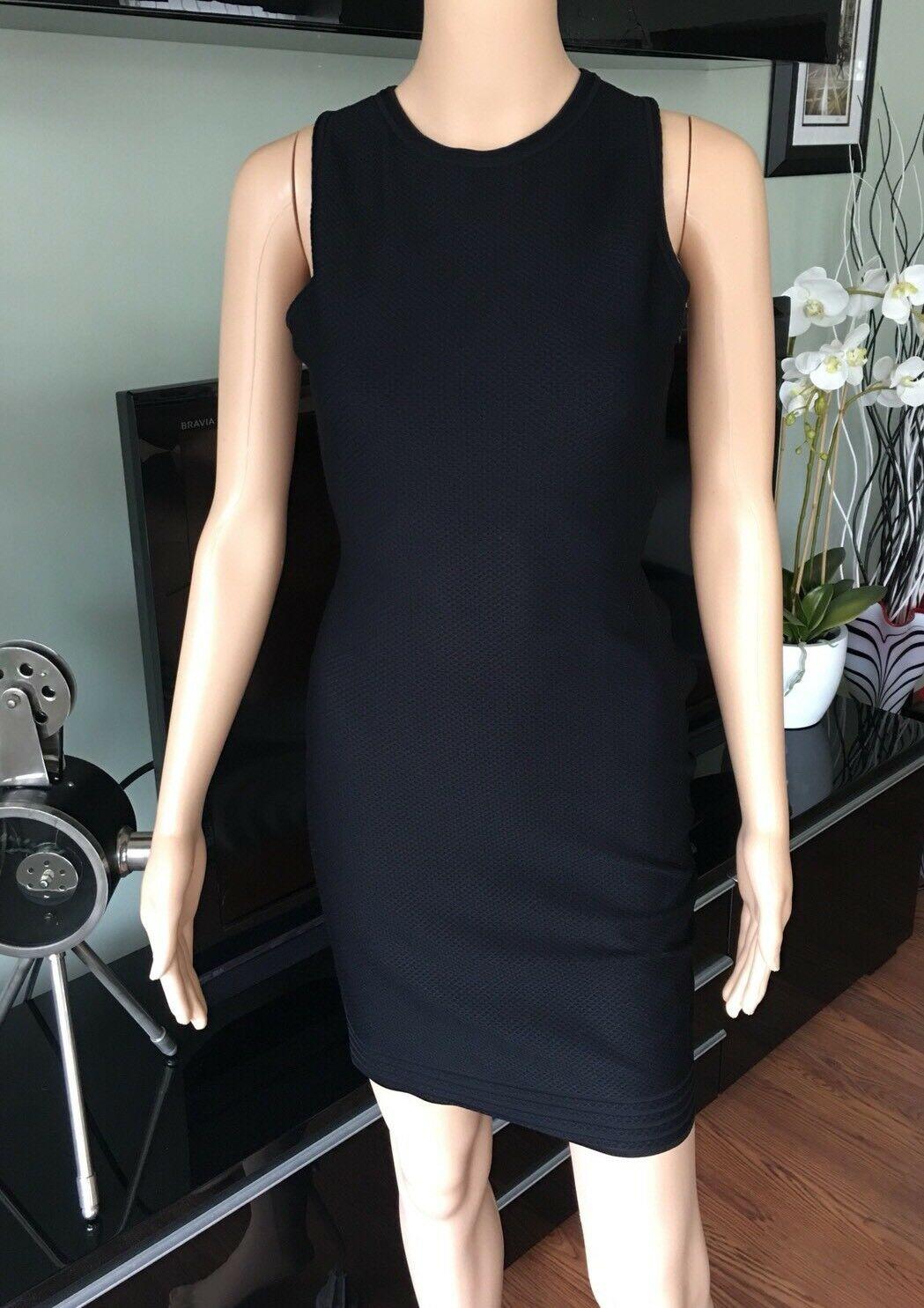 Azzedine Alaia Sexy Open Back Fitted Dress Size FR 38

Black Alaïa sleeveless knit mini dress with crew neck, cross-over straps at open back and concealed zip closure at side.

All Eyes on Alaïa

For the last half-century, the world’s most
