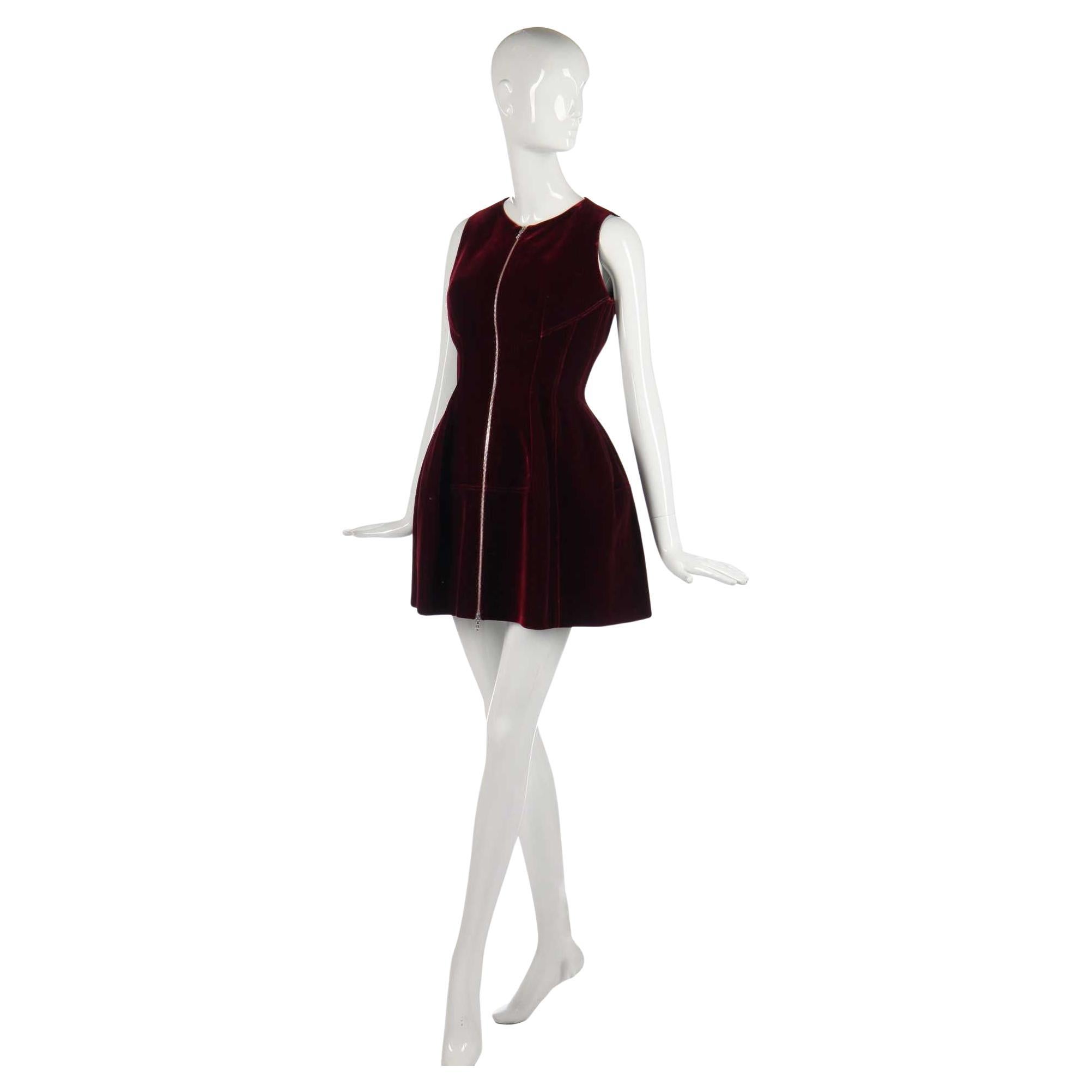 Azzedine Alaïa burgundy velvet dress from 1980s-1990s. Spectacularly structured mini dress with front-facing metal zipper. Formed into a tulip-like shape by top-stitched figure-hugging panels. A deep burgundy, wine red. Perfect for fall and winter,