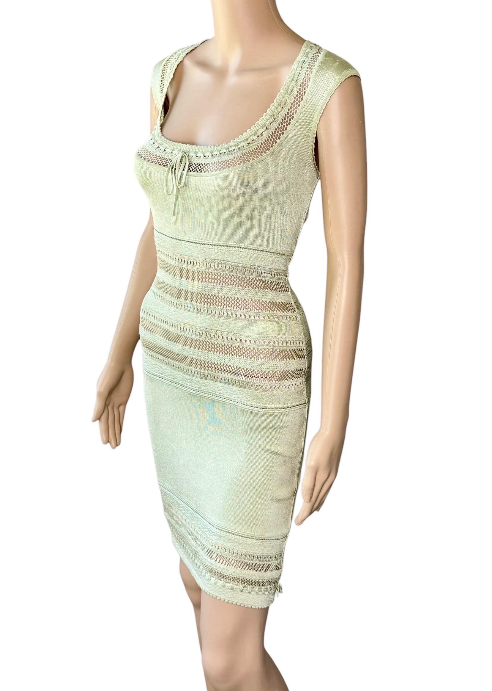 Azzedine Alaia c. 1993 Vintage Semi-Sheer Crochet Open Knit Bodycon Green Dress 

Size: S

Alaïa sleeveless bodycon mini dress with open knit paneling throughout, scoop neck featuring tonal bow accent at collar, scalloped trim and concealed zip