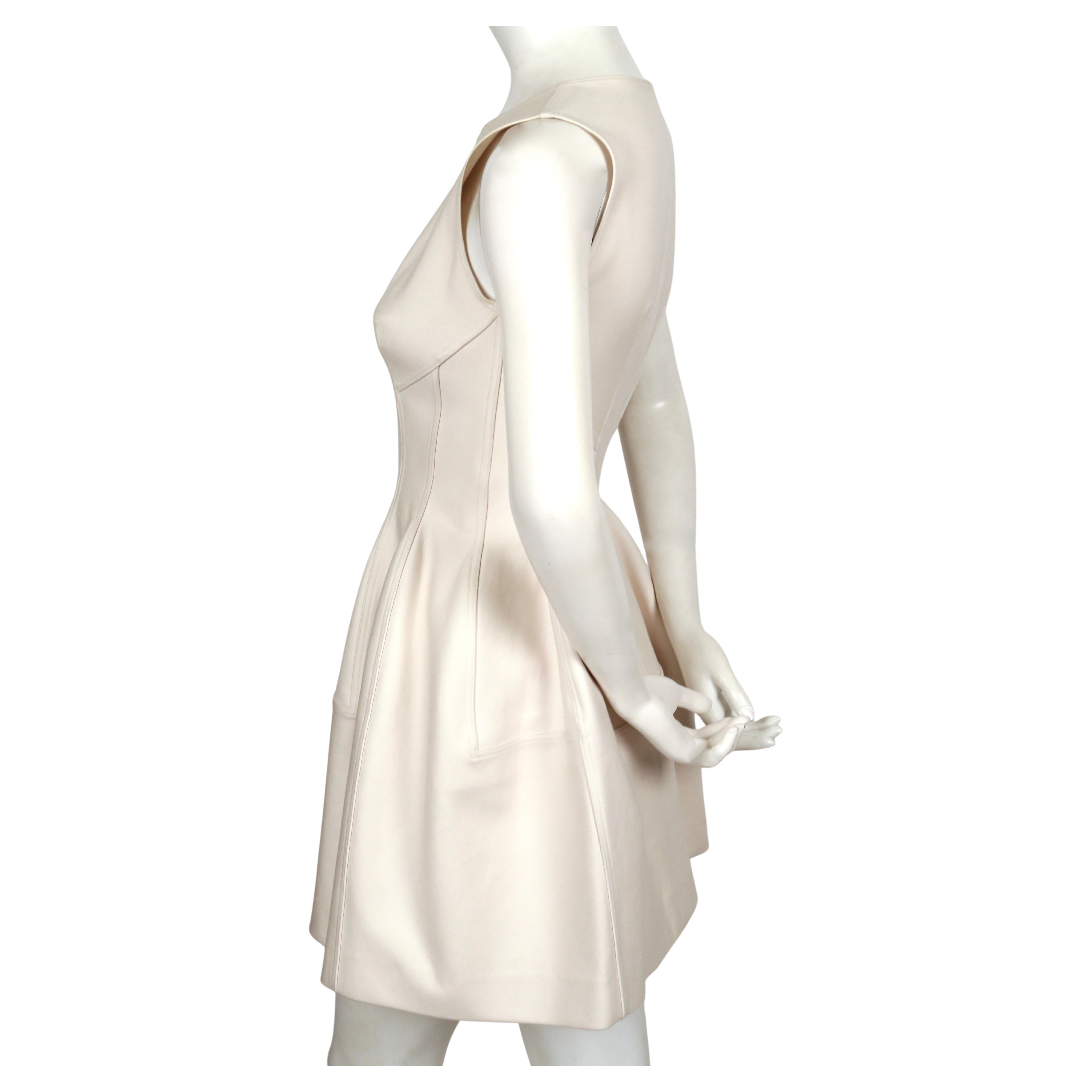 AZZEDINE ALAIA cream tulip dress with zipper front In Good Condition For Sale In San Fransisco, CA