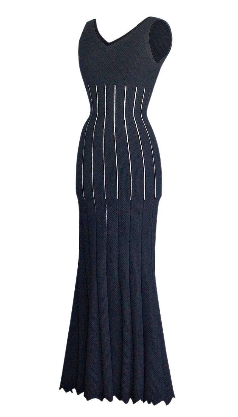 Guaranteed authentic Azzedine Alaia stunning black full length knit dress.
No one designed for the shape of a womans body like the master Azzedine Alaia.  Gone far too young the world of fashion will miss him.
Gorgeous black floor length knit formal