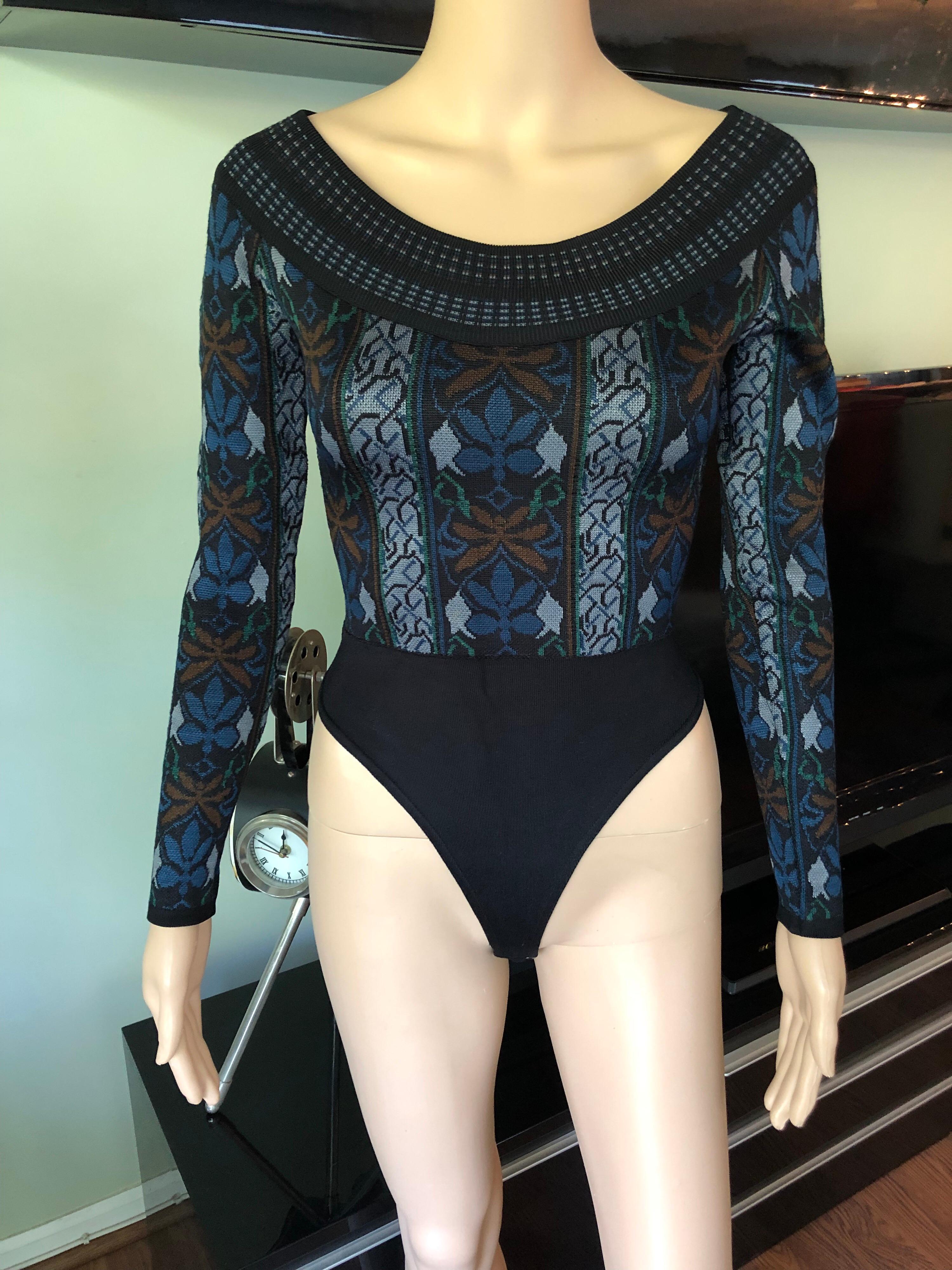 Azzedine Alaia F/W 1990 Vintage Knit Bodysuit XS

Alaïa vintage knit bodysuit with abstract pattern throughout, scoop neck and snap closures at inseam.
