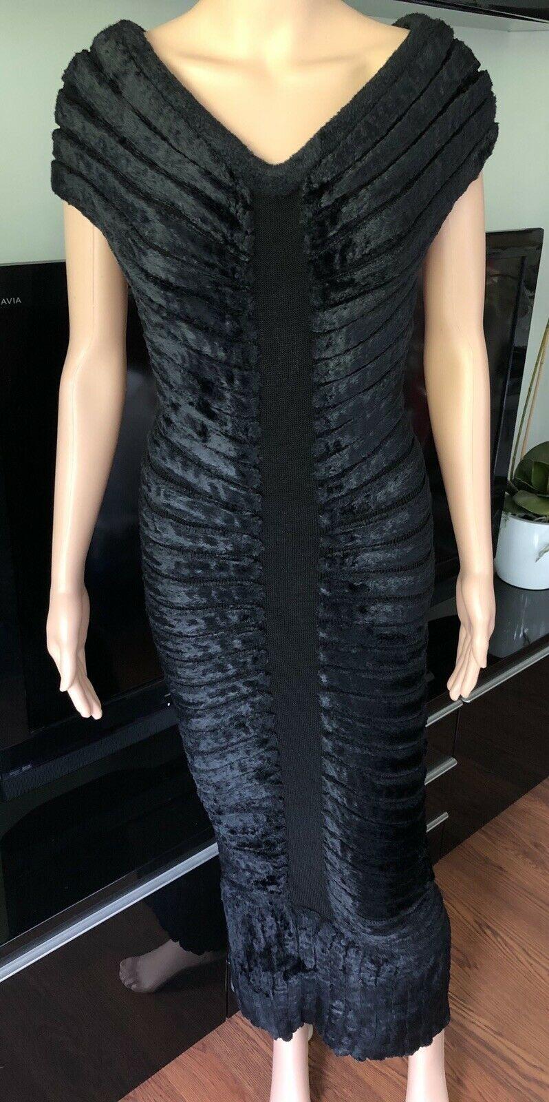 Azzedine Alaia S/S 1994 Vintage Black Long Chenille Dress Size XS

Black Alaïa sleeveless maxi dress with scoop neck and zip closure at center back.

All Eyes on Alaïa

For the last half-century, the world’s most fashionable and adventuresome women